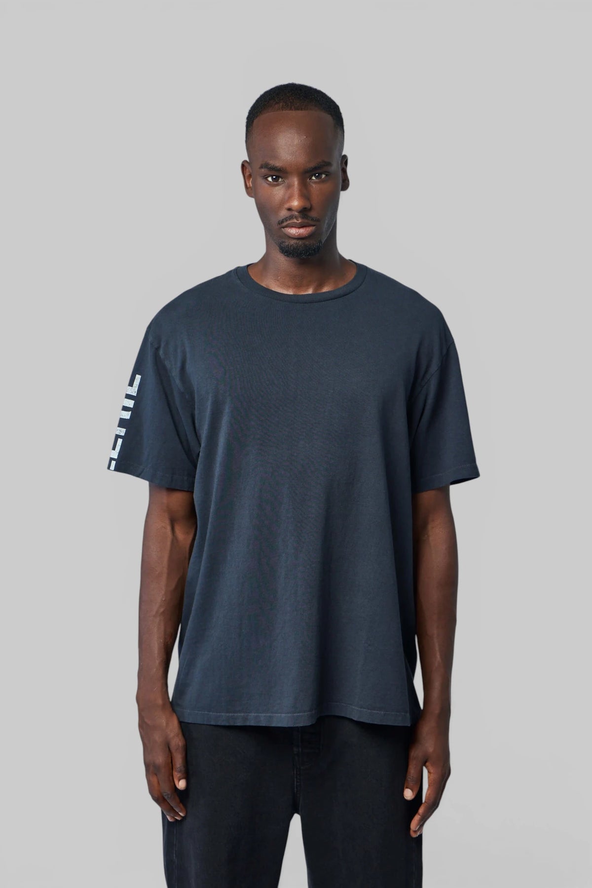 Model wearing Gallery Dept. French Collector Tee with jeans