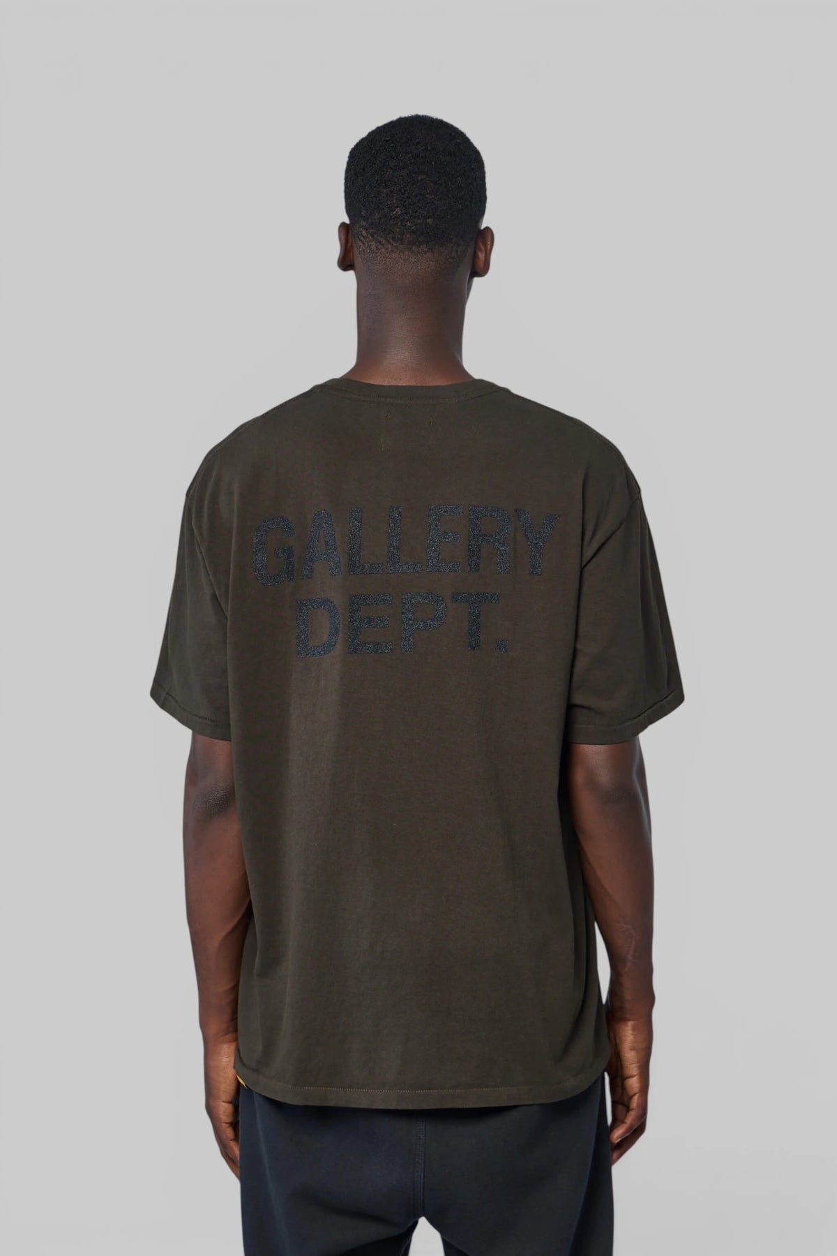 Model wearing Gallery Dept. GD Logo Dusty Tee in true to size fit