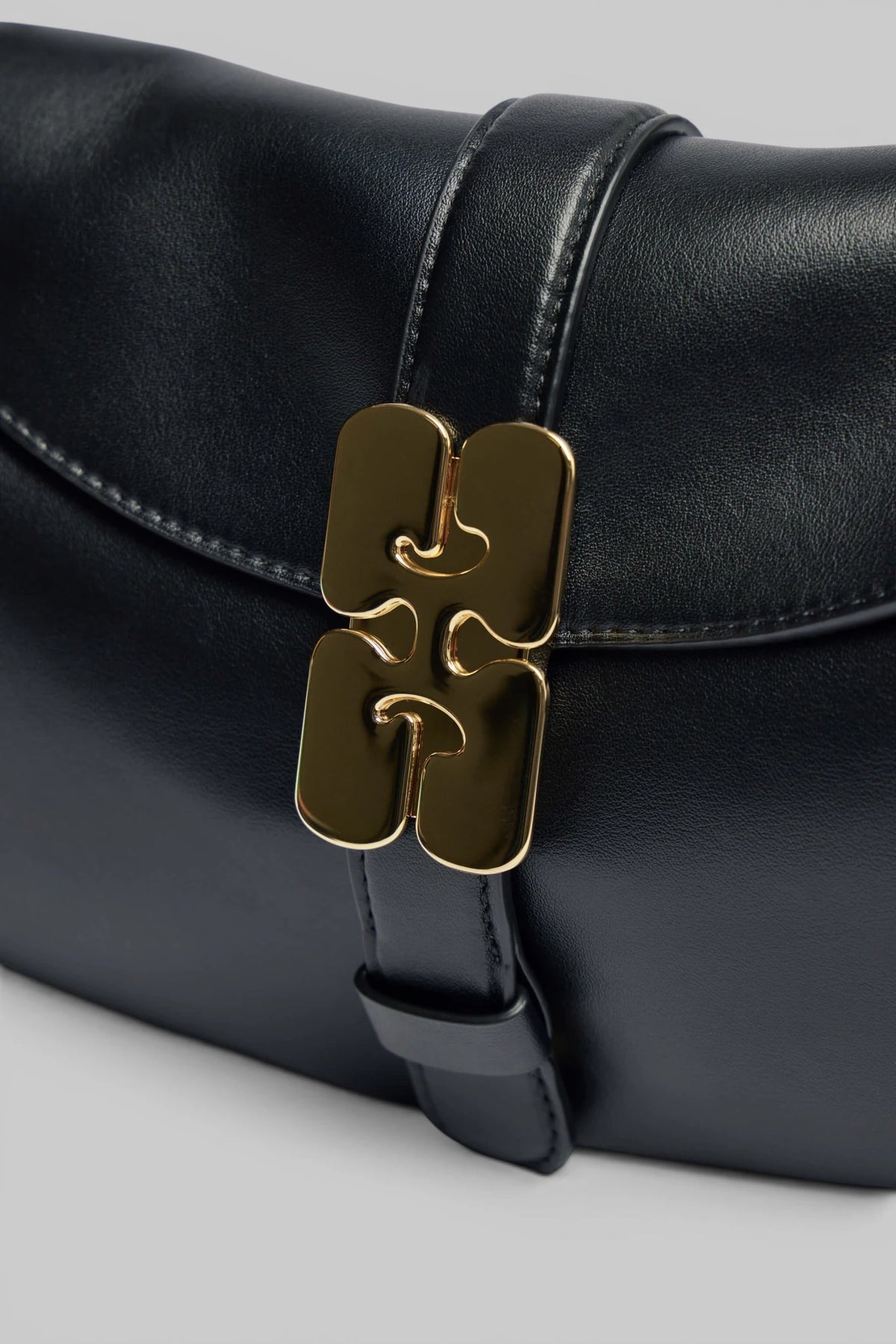 Side profile of Ganni B-Kat bag highlighting sustainable construction