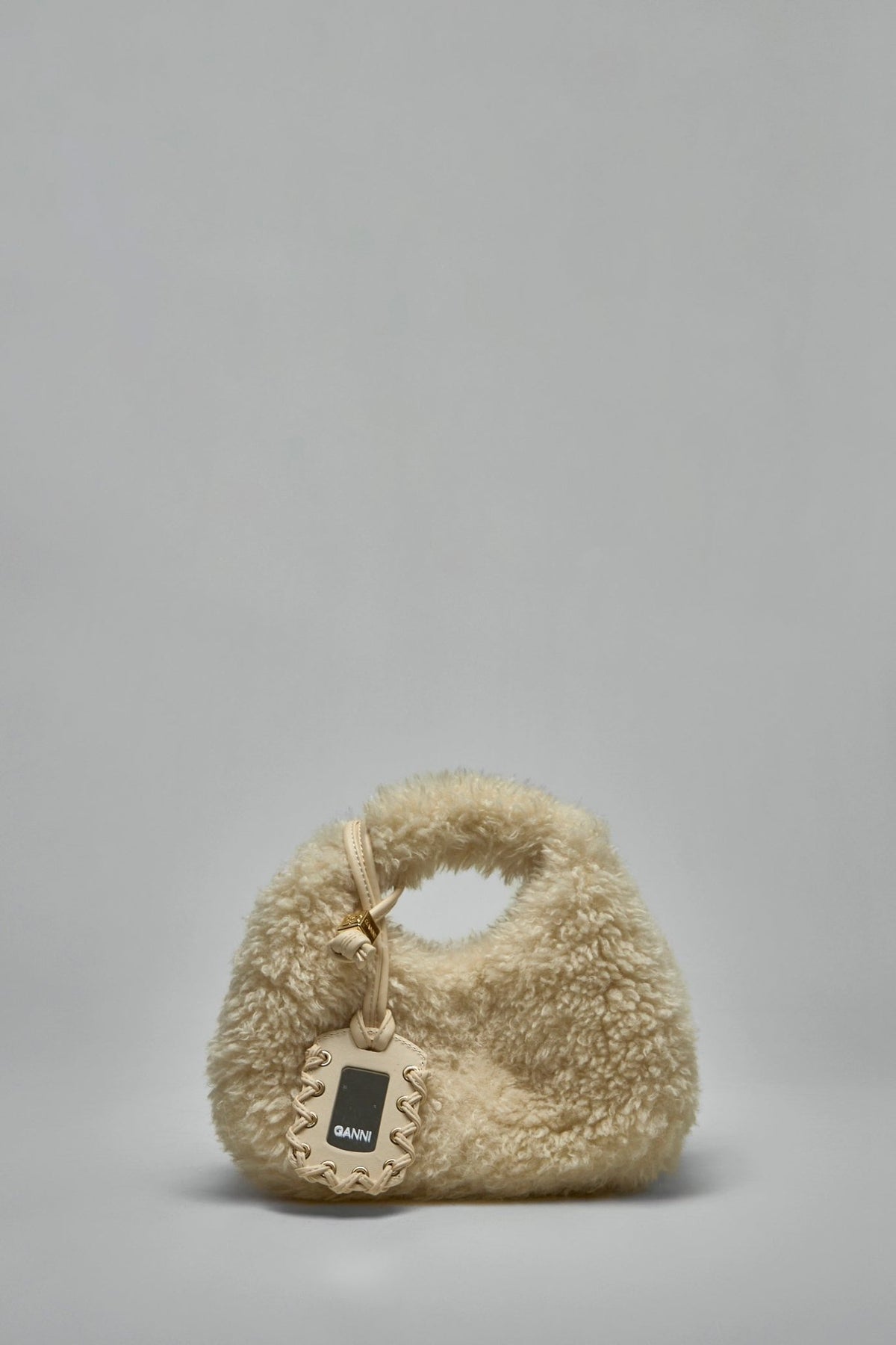 Ganni Top Handle Bags hobo mini in cream alternative fur with circular handle