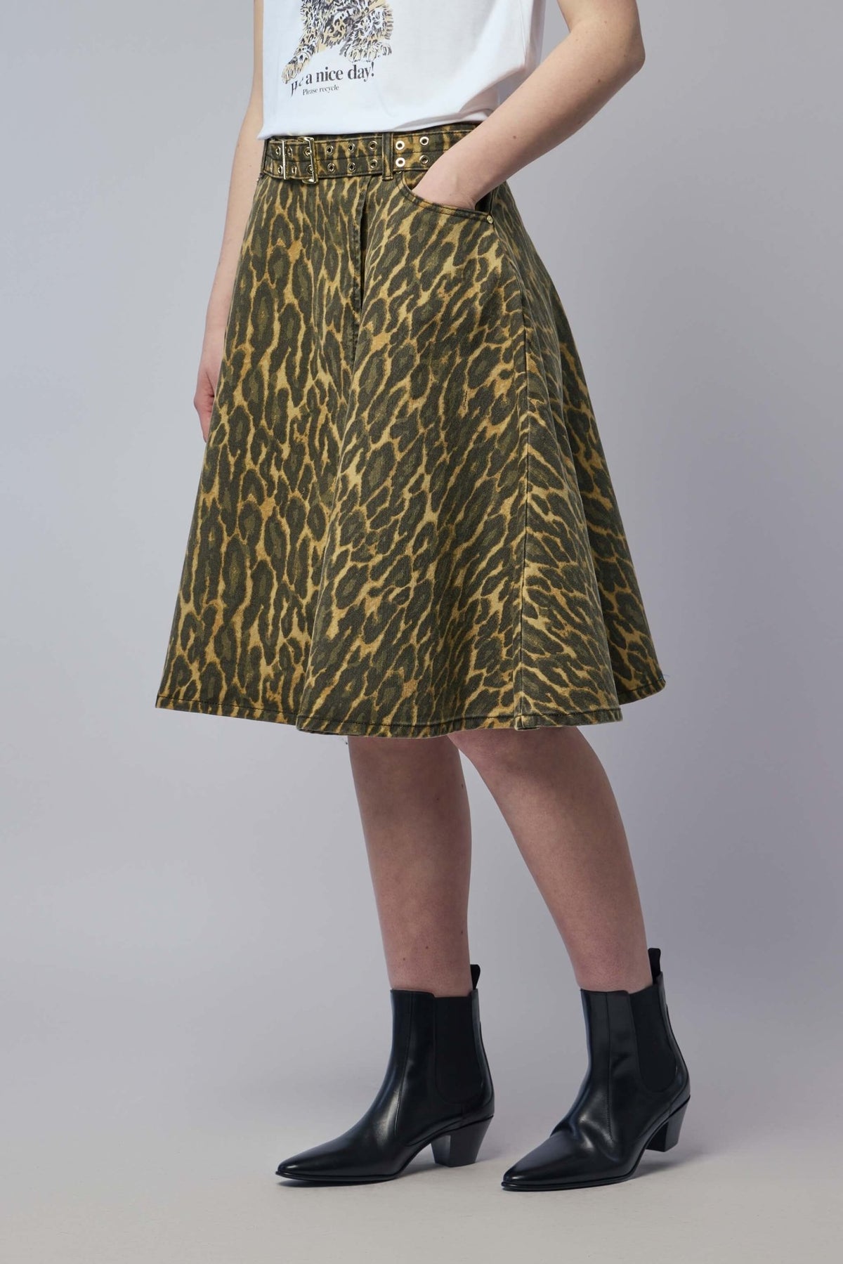 Model wearing Ganni print denim wrap midi skirt with A-line silhouette
