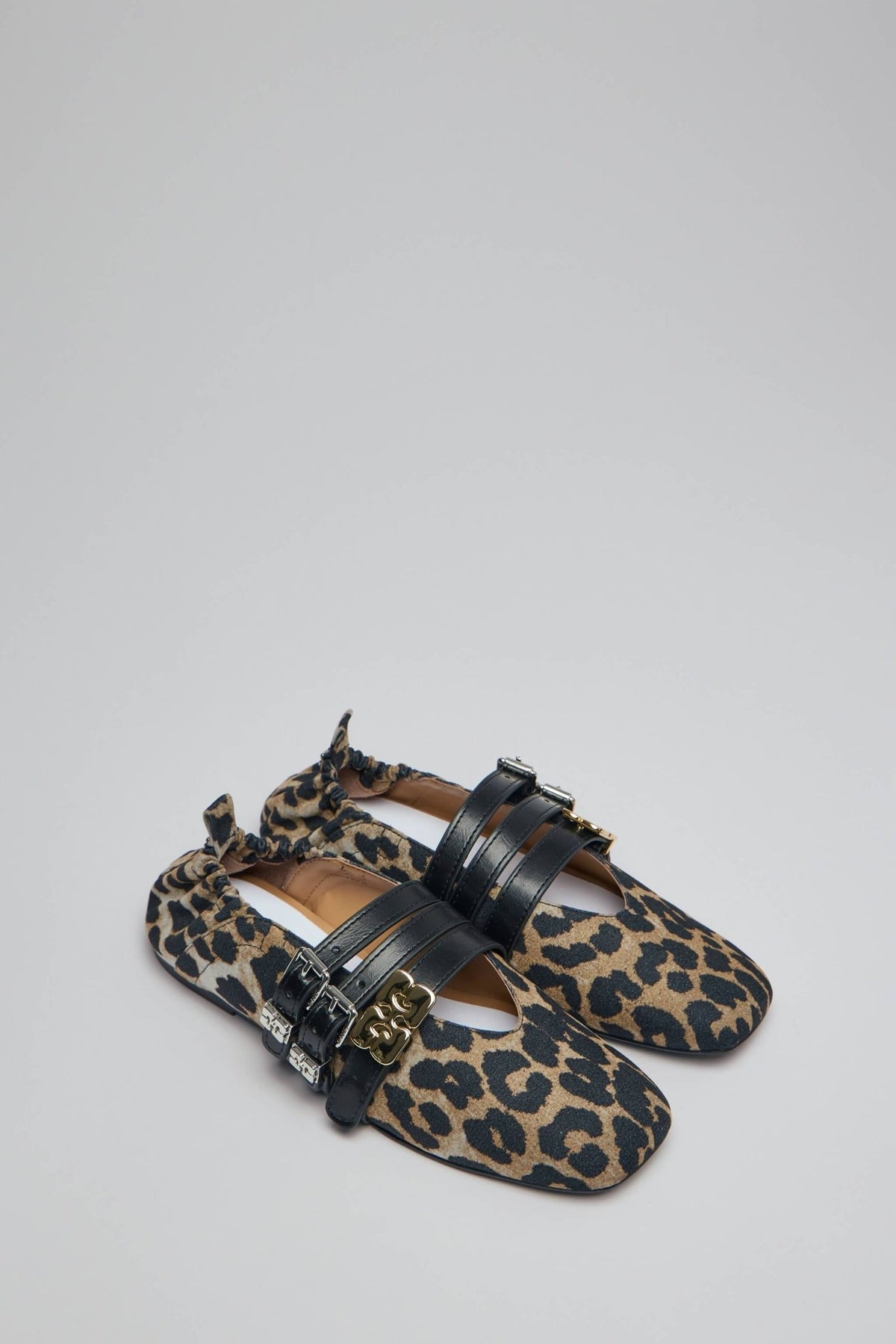Overhead view of Ganni sustainable flats displaying buckle accents