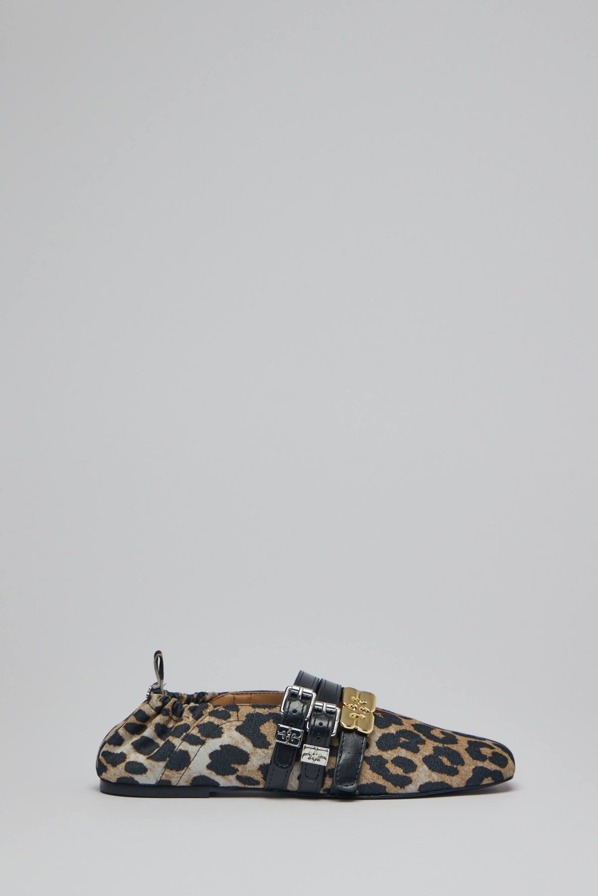 Ganni flats in leopard print with decorative buckles and recycled leather construction
