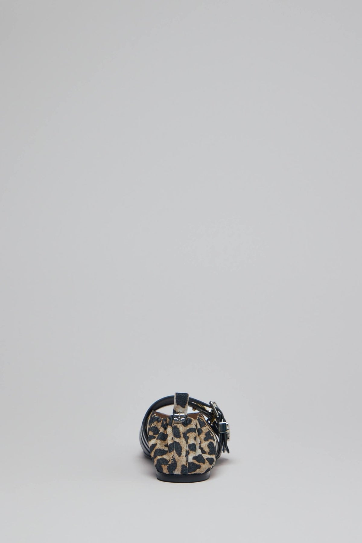 Close-up view of Sue Triple Ballerina flats showing flocked denim print detail