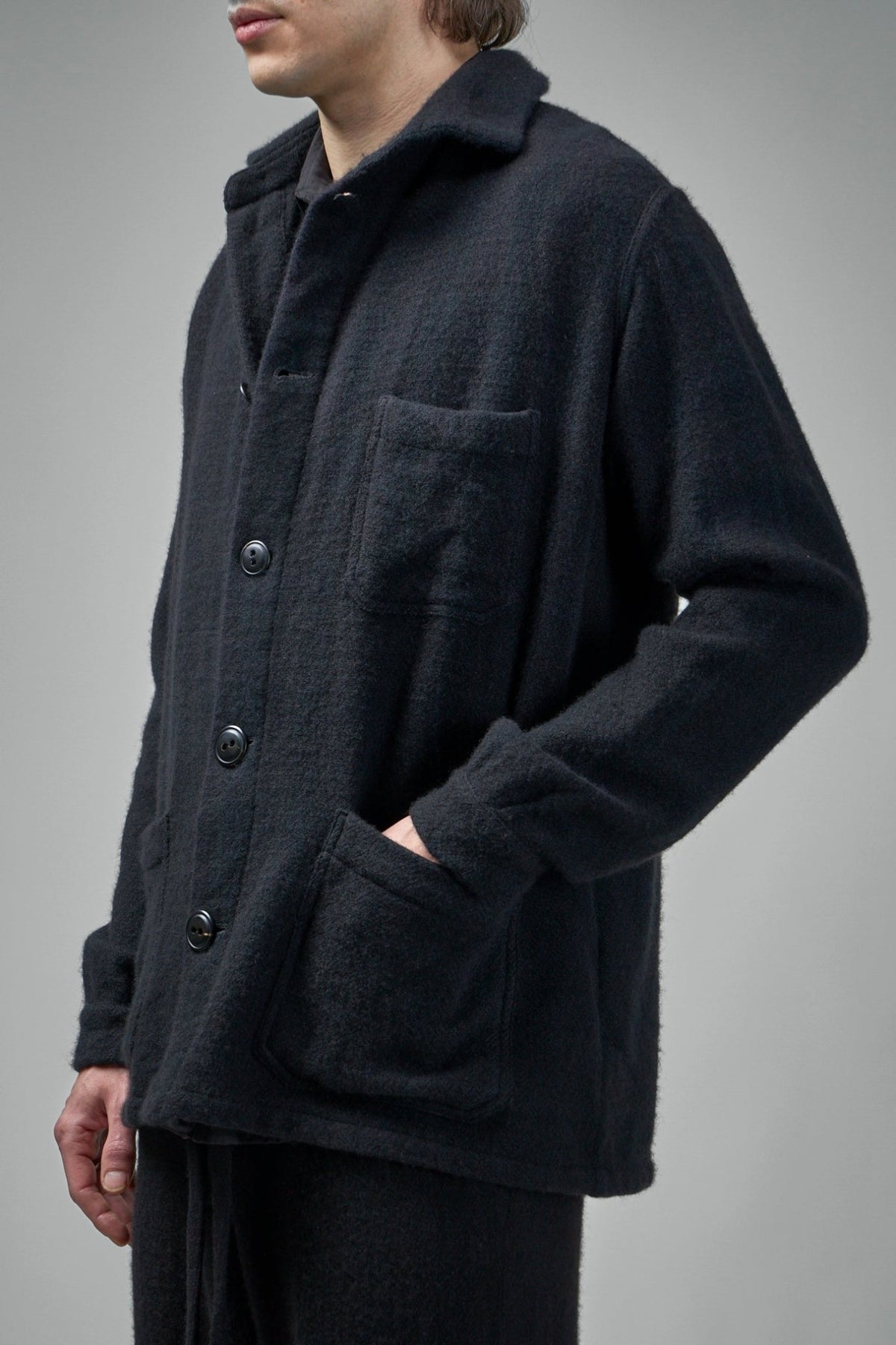 Detail shot of hand-dyed cashmere texture and four-pocket design