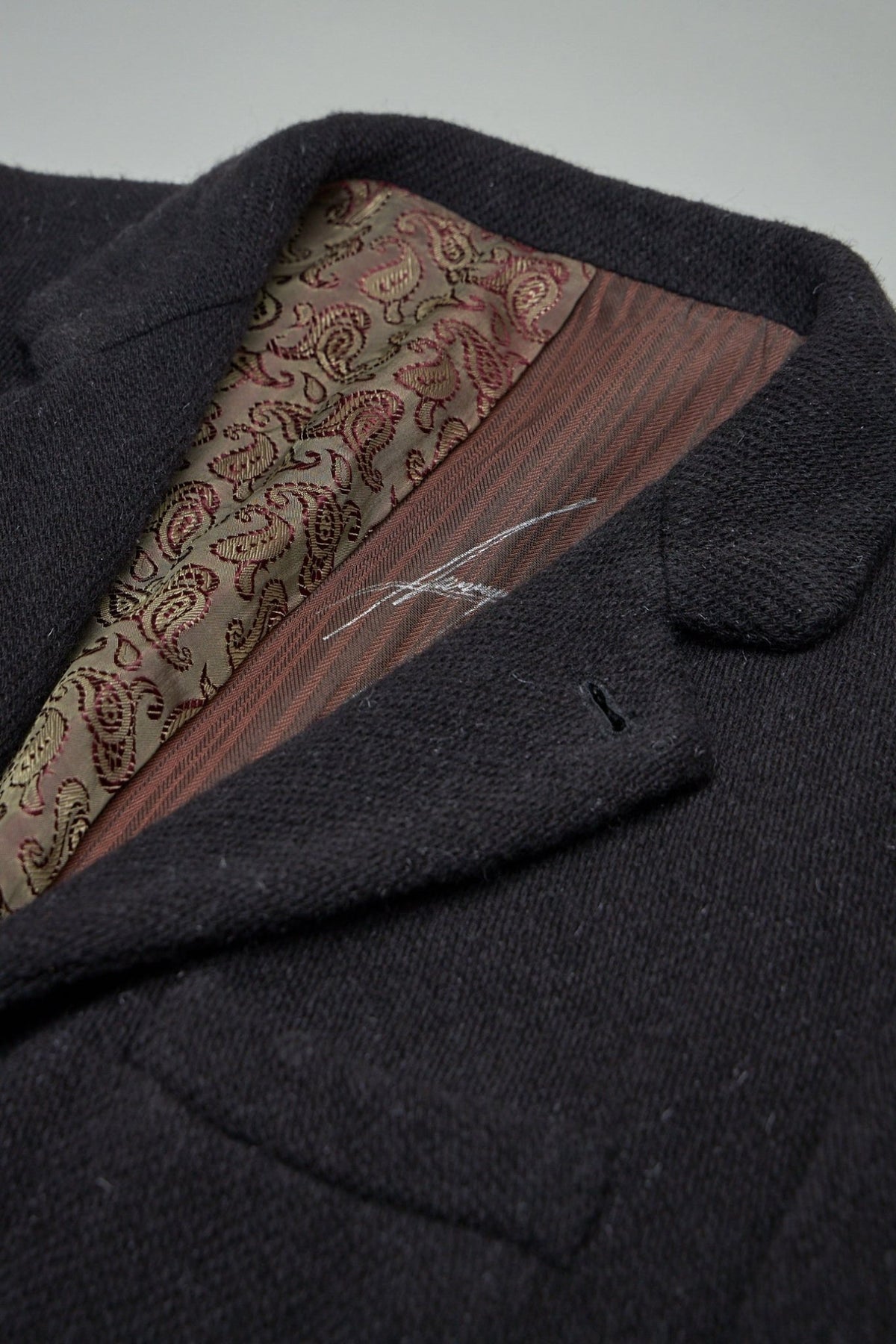 Detail shot of Fontana real horn buttons and monk's twill fabric texture, view 5