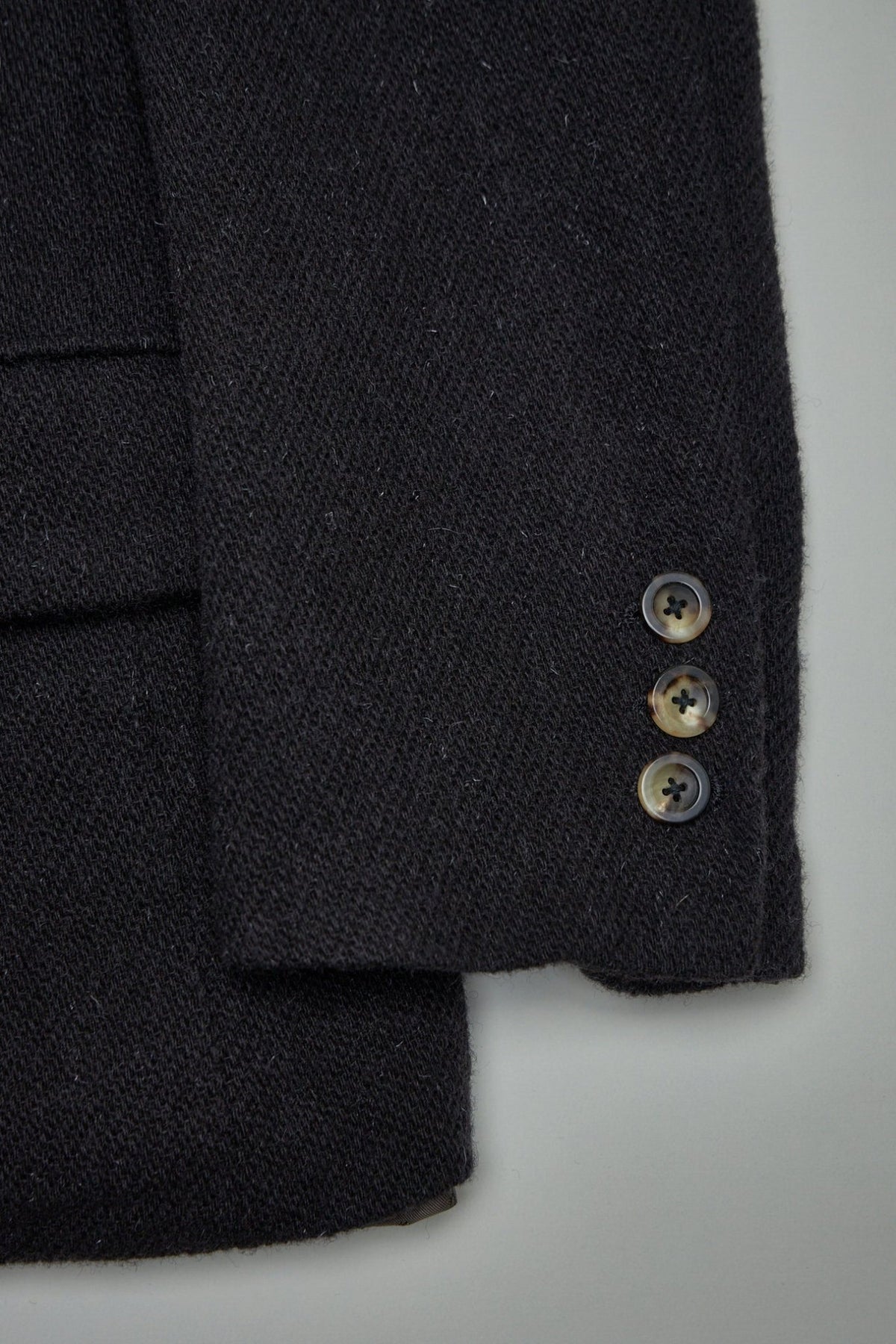 Detail shot of Fontana real horn buttons and monk's twill fabric texture, view 9