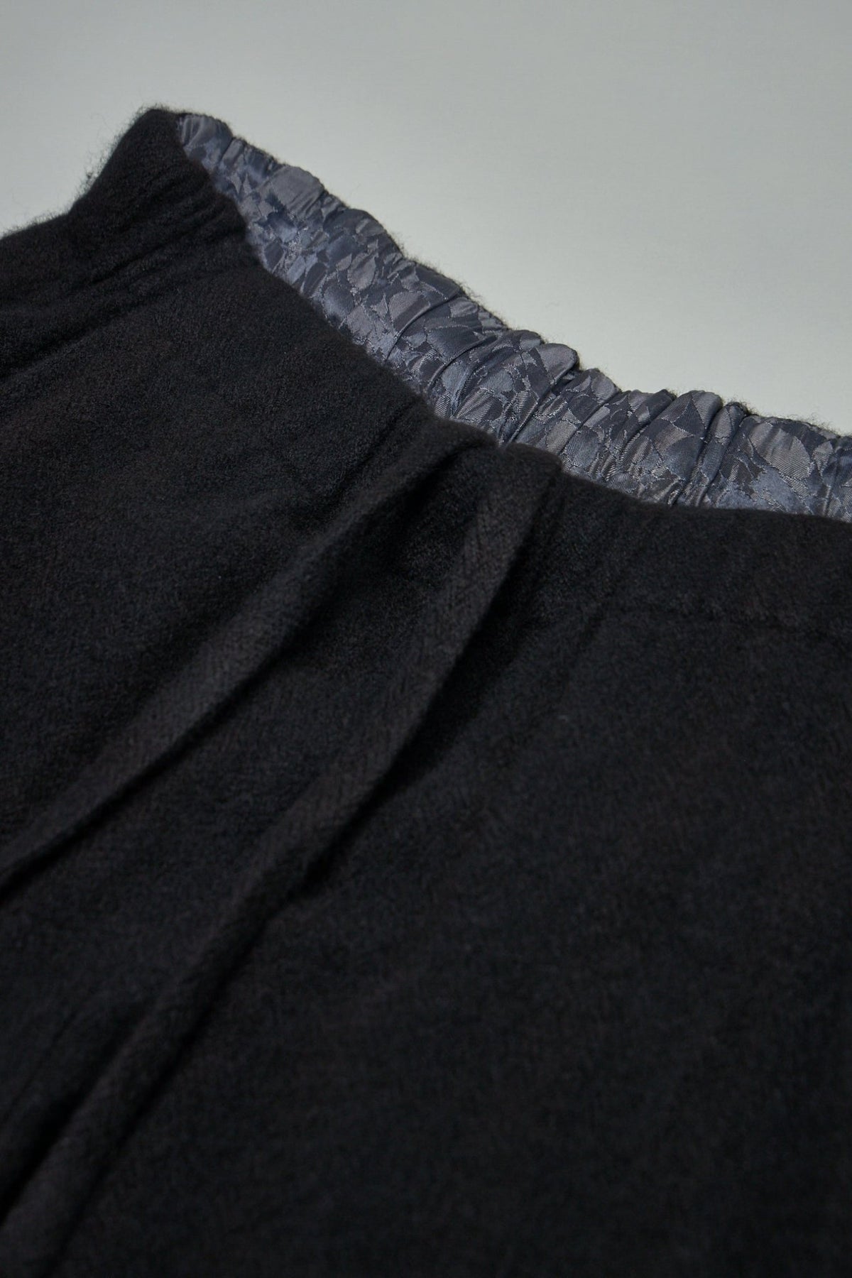 Fabric texture detail showing the exclusive ultrasoft hyperlux cashmere