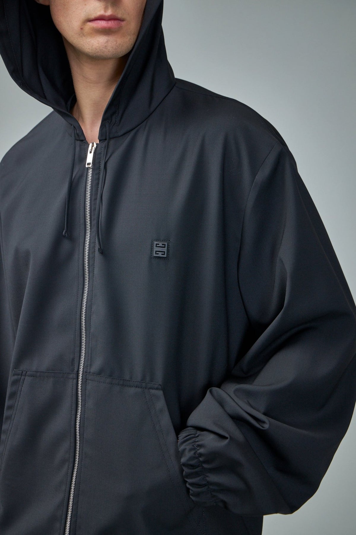 Back view of Givenchy wool blouson highlighting sophisticated tailoring and fit