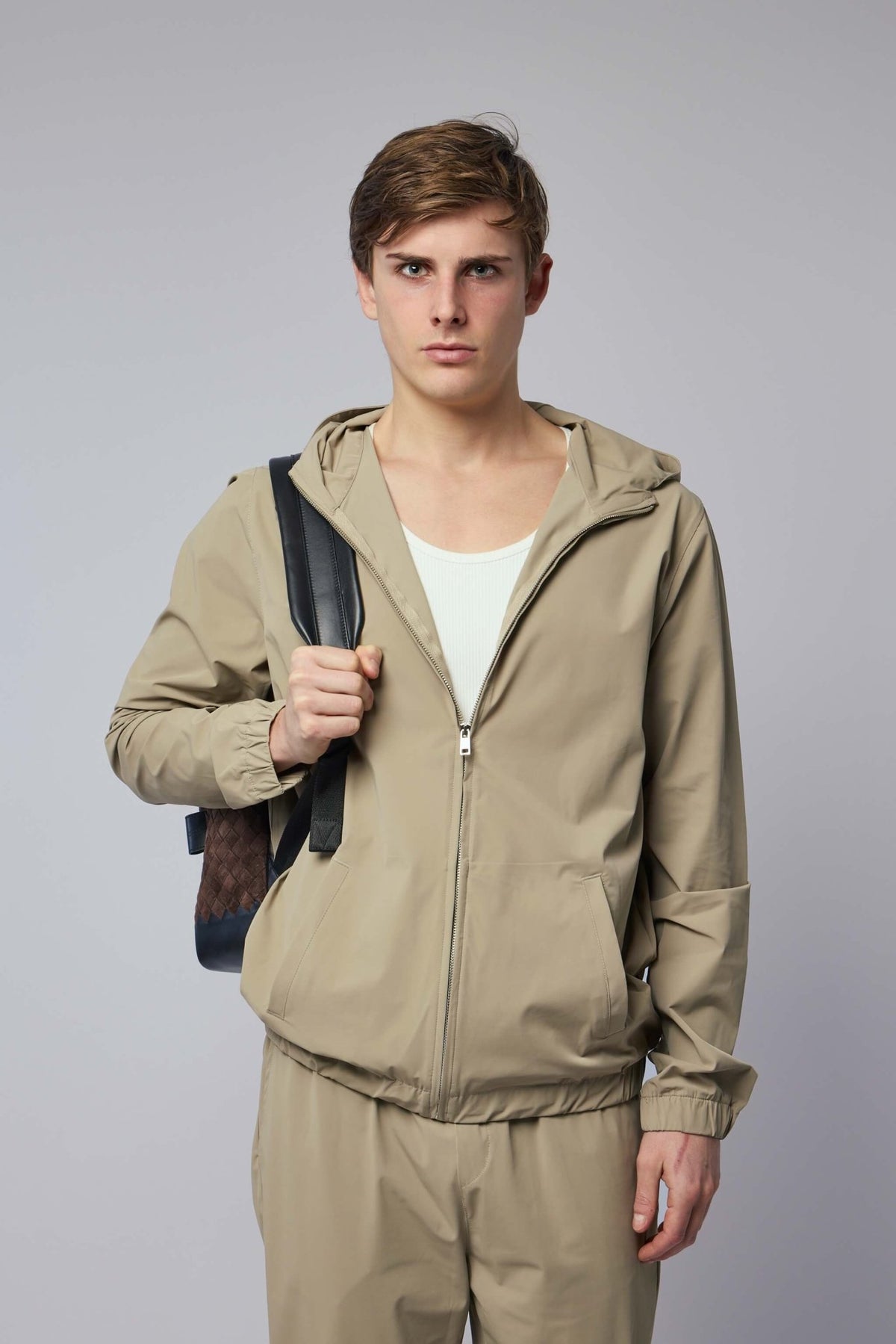 Gogetti Jackets Helix in beige with minimalist design and hood