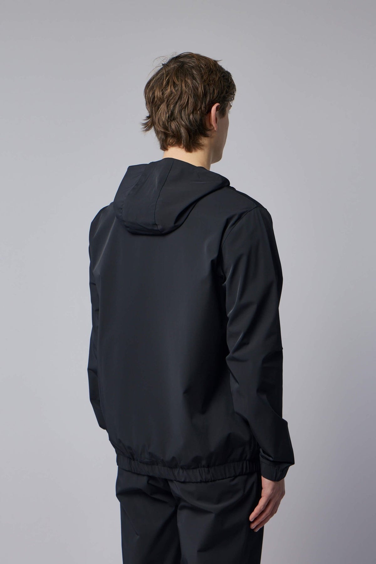 Model wearing size L Gogetti Helix Hooded Jacket, full body shot