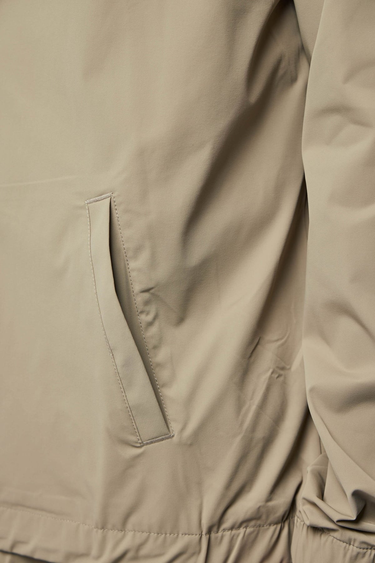 Helix jacket side pockets and adjustable hood detail