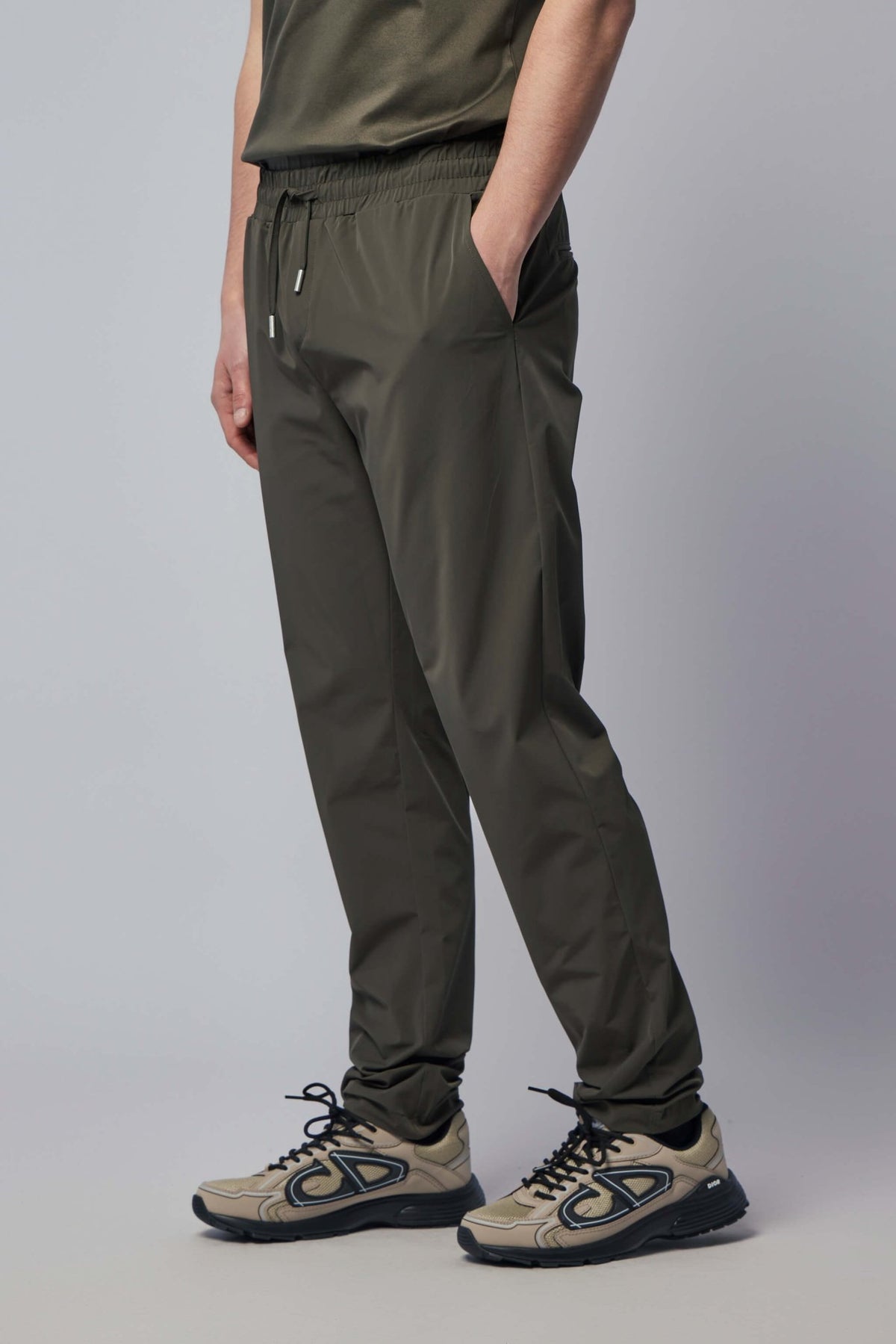 Side profile showing straight leg design and functional pocket placement