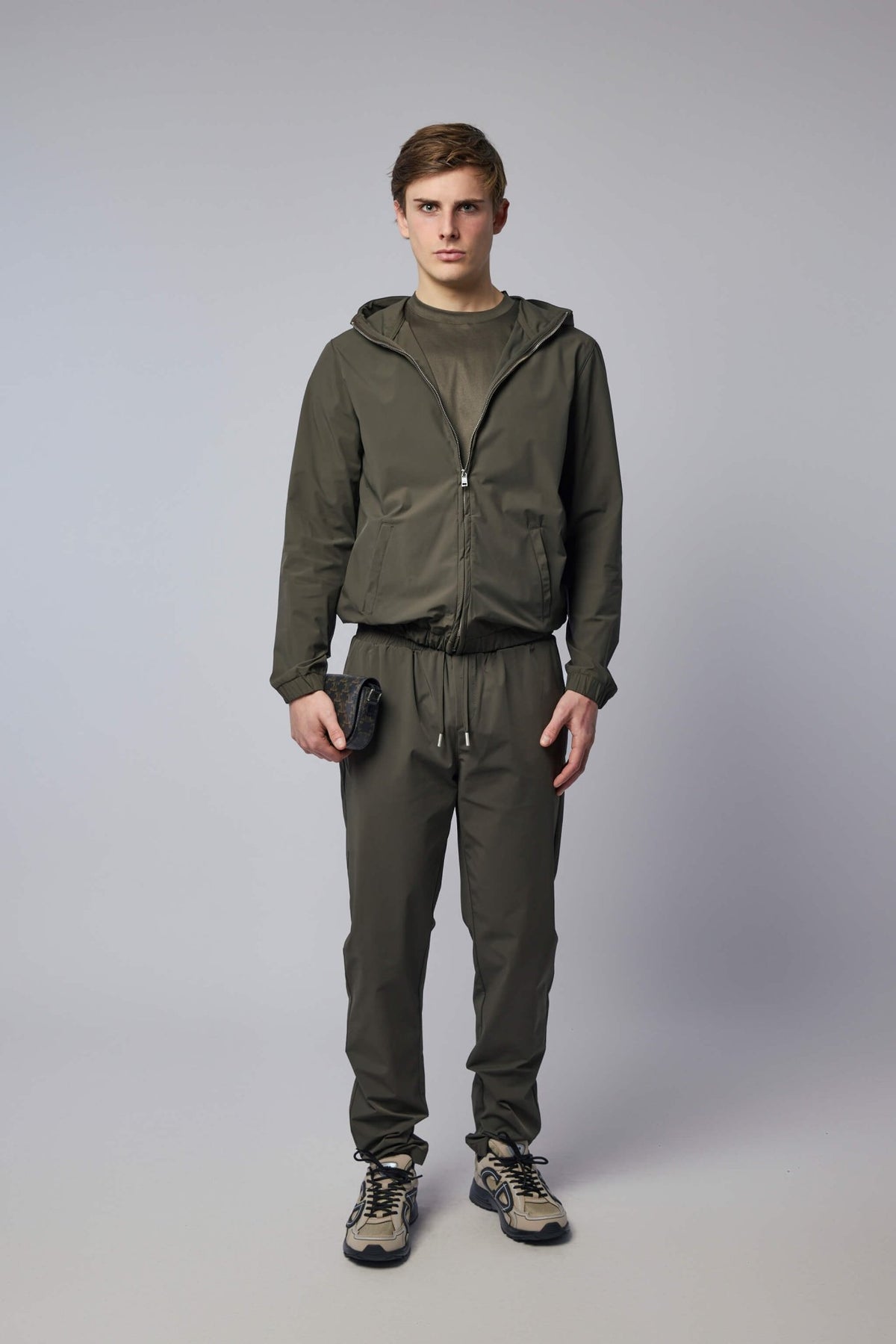 Full-length view showcasing the contemporary silhouette and fit