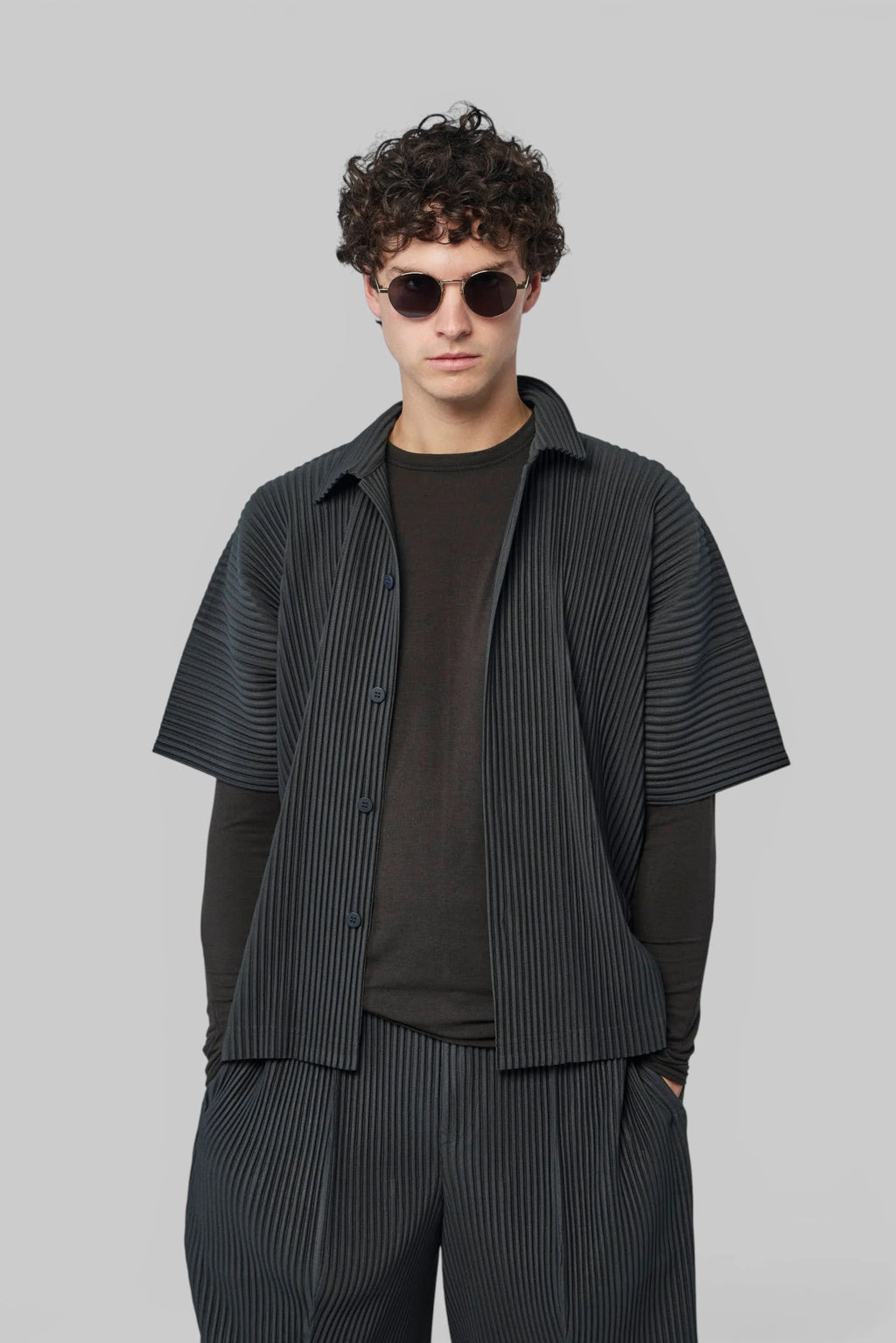 Homme Plissé Issey Miyake August Pleats shirt in vertical stripe pattern, front view