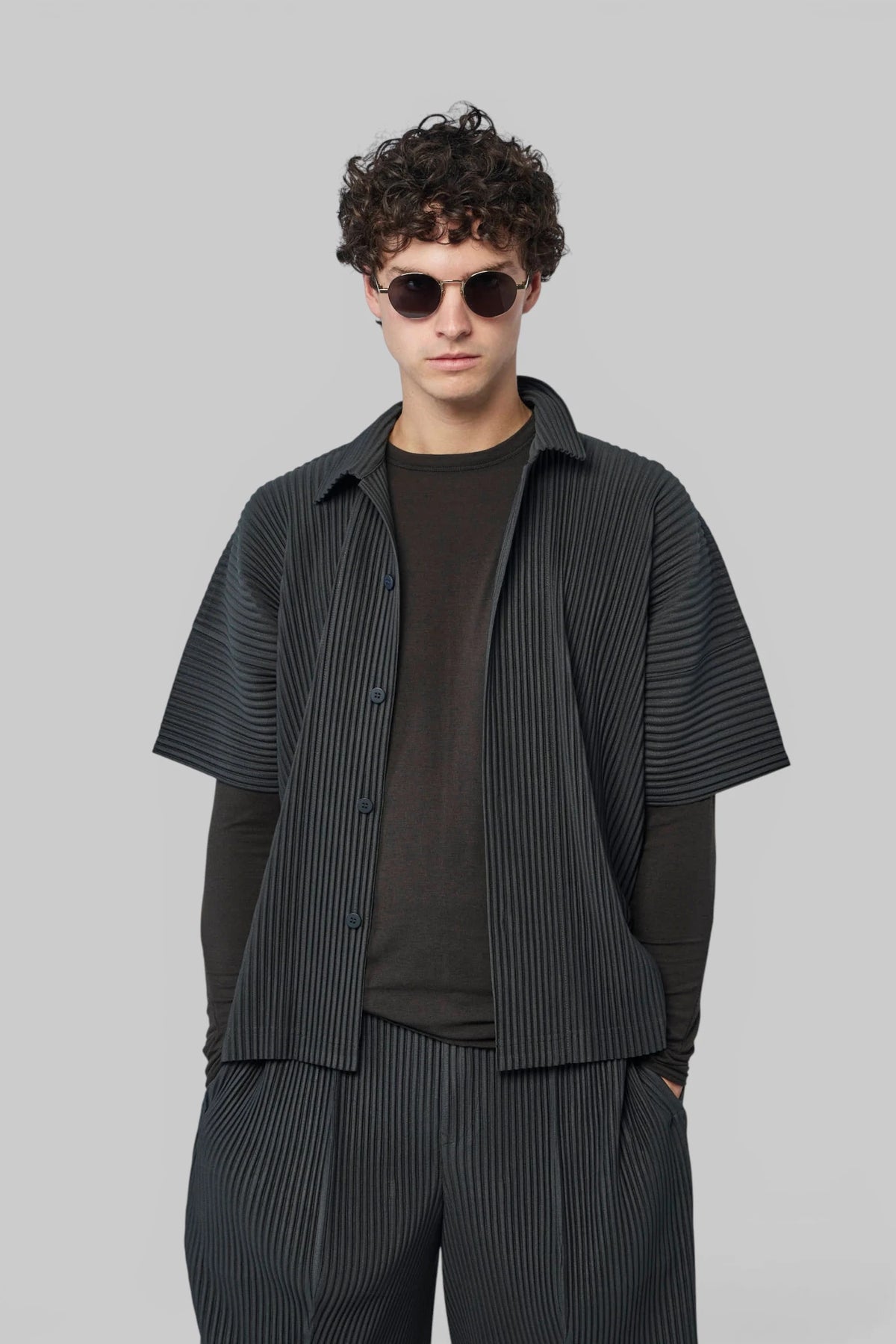 Homme Plissé Issey Miyake August Pleats shirt in vertical stripe pattern, front view
