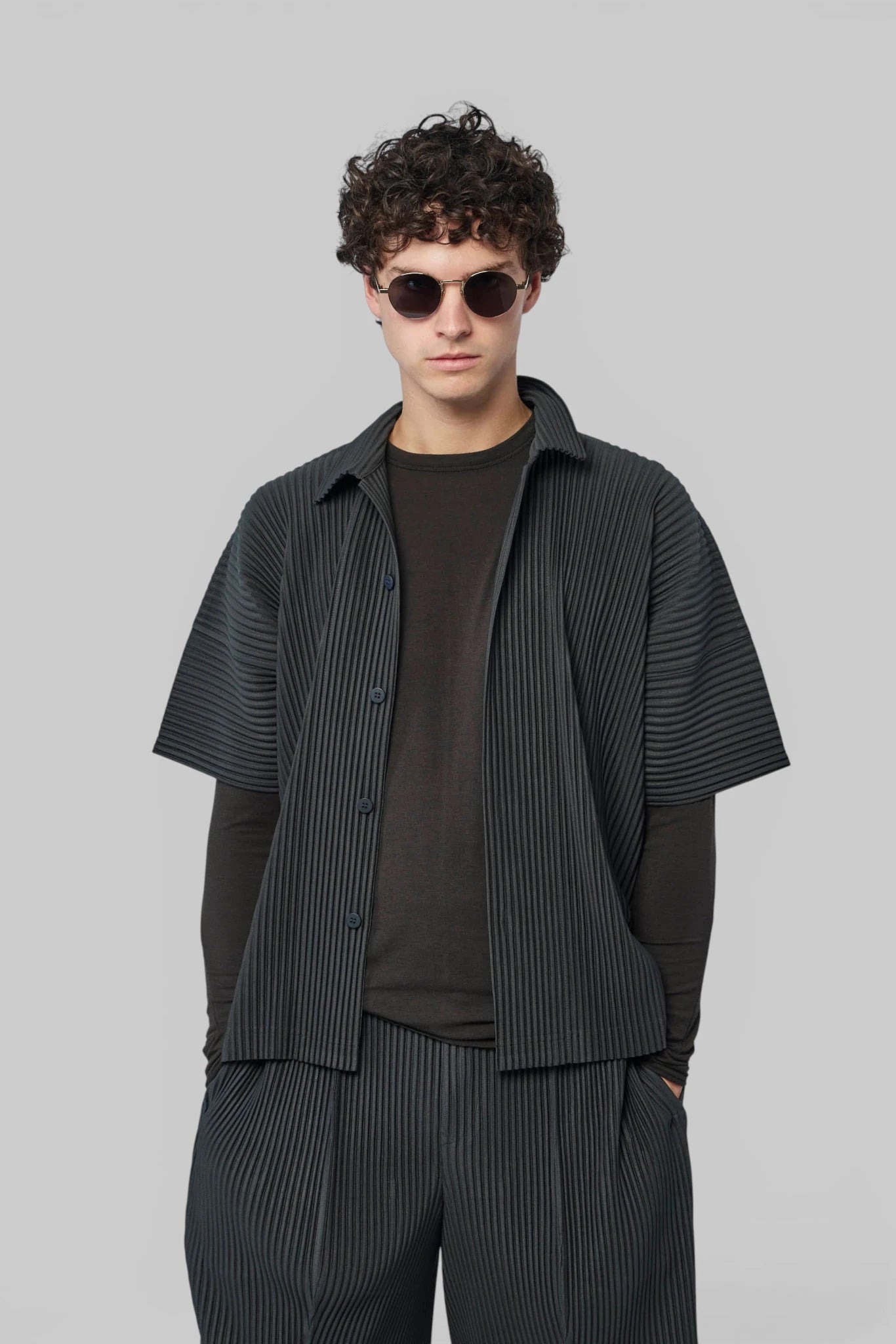 Homme Plissé Issey Miyake August Pleats shirt in vertical stripe pattern, front view