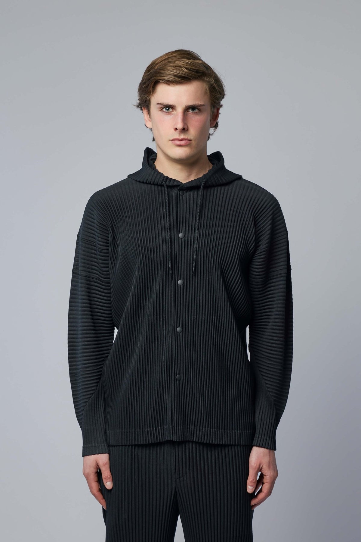 Close-up of unique ribbed fabric texture on Japanese designer hoodie