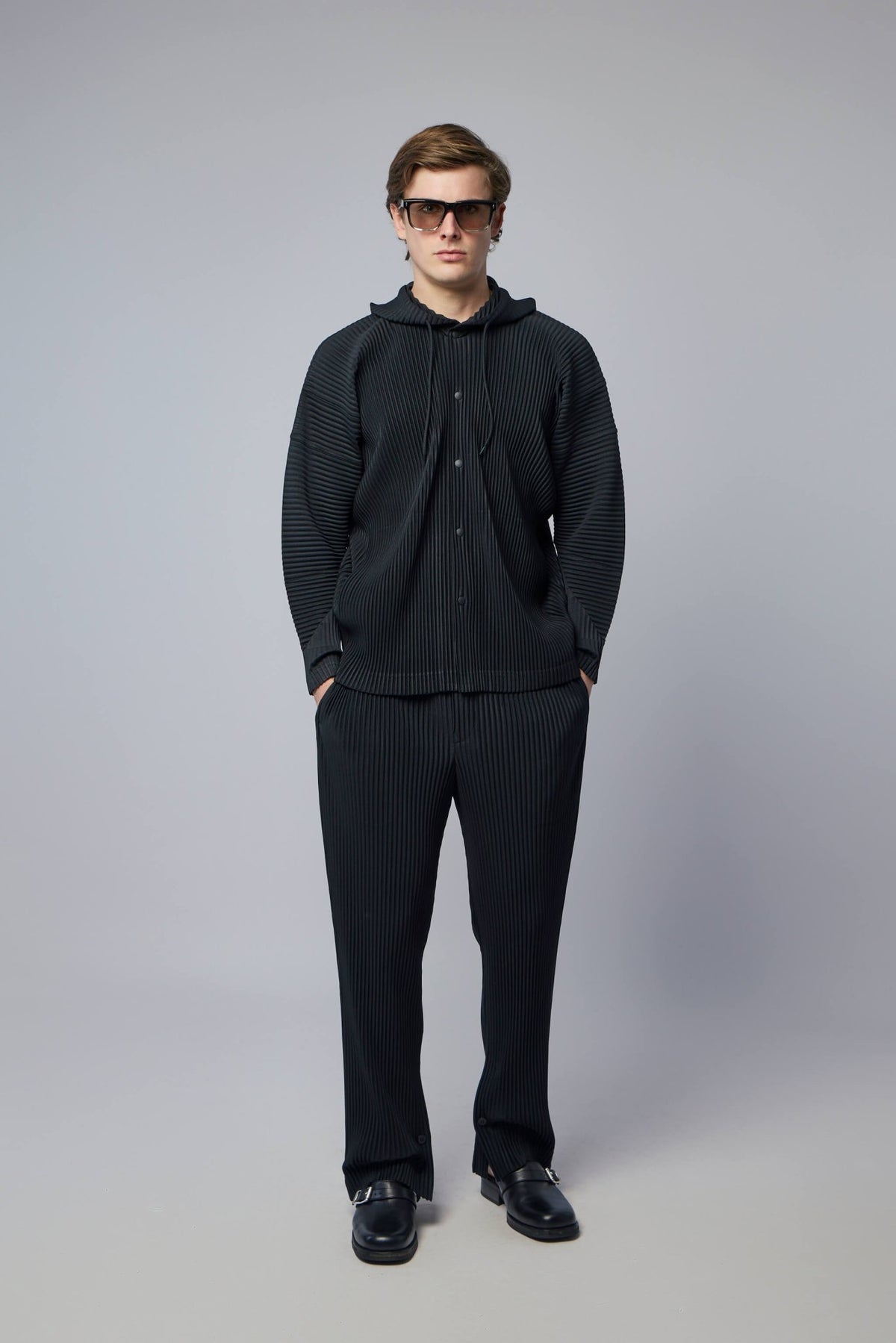 Product flat lay displaying construction details and fit