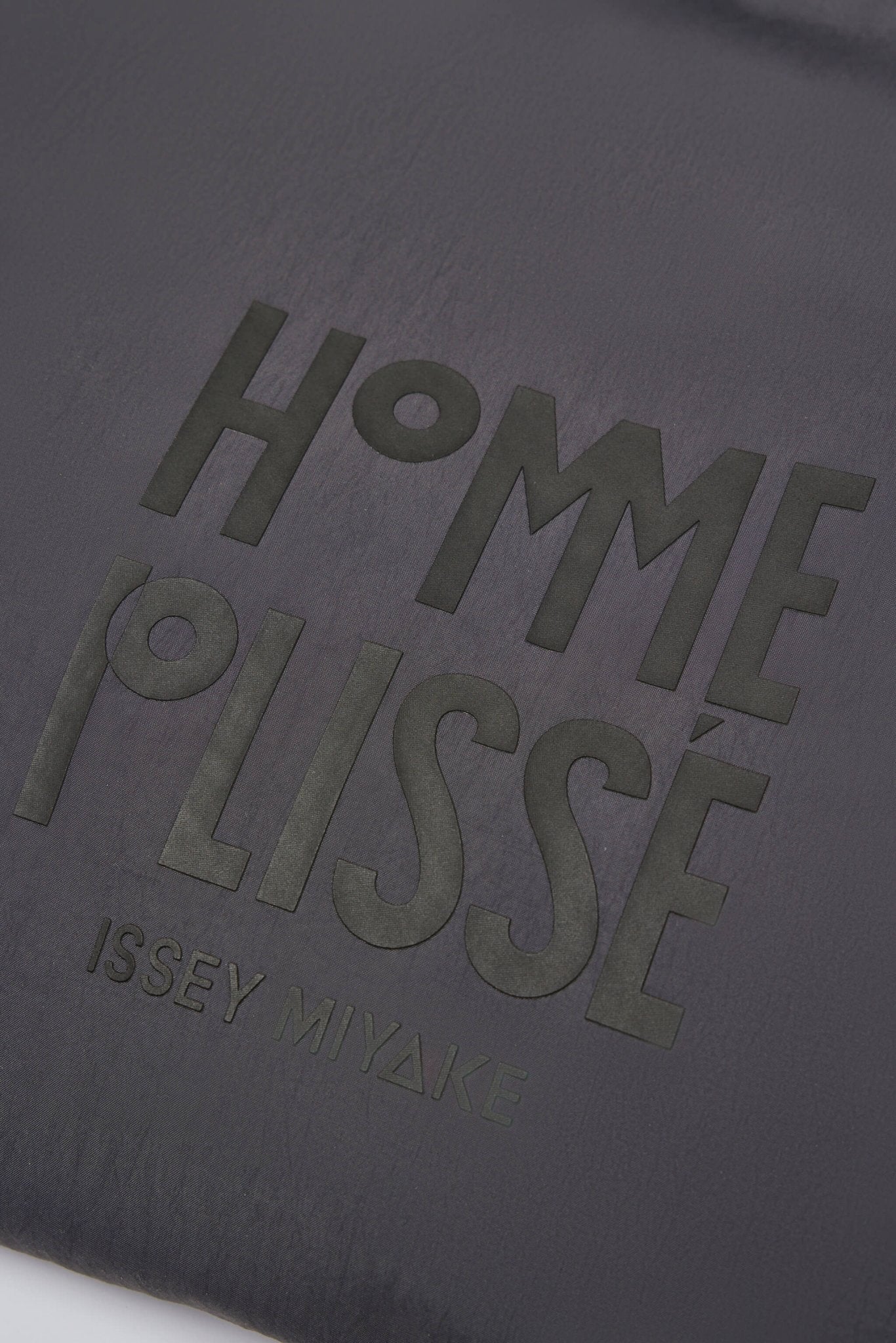 Homme Plissé Issey Miyake - Carrier Carried Coat - LABELS