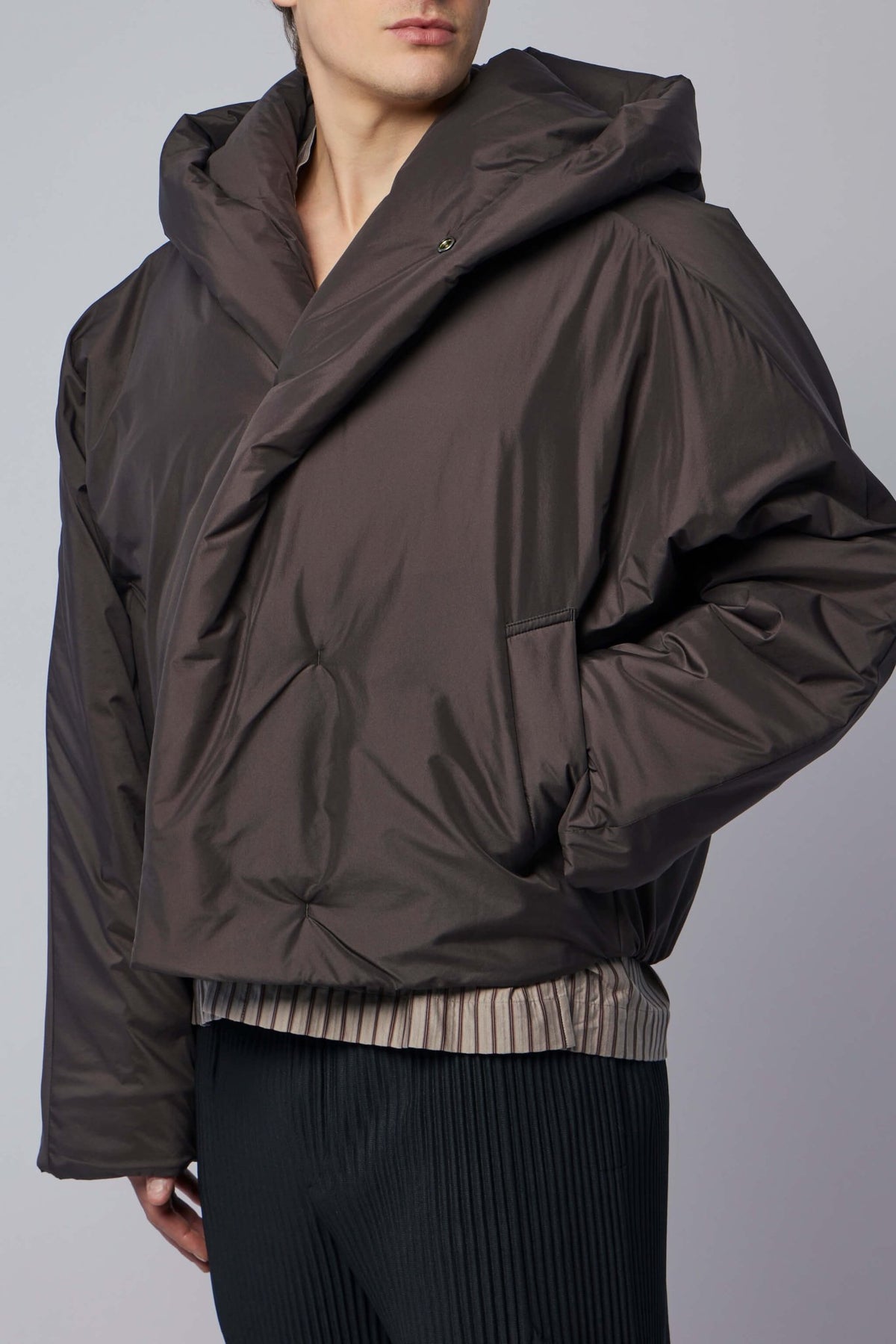 Close-up of concealed front closure and side pocket details