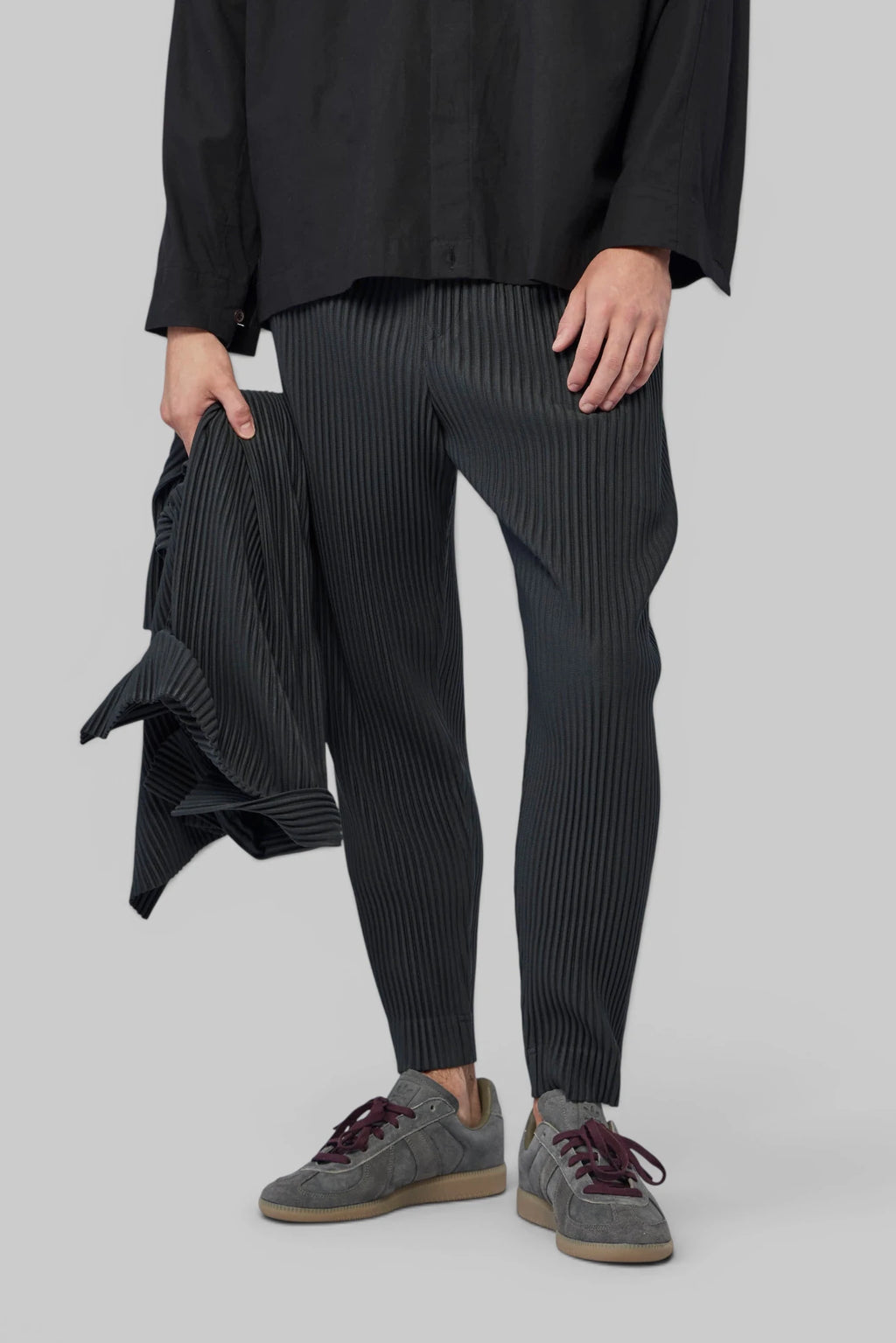 Homme Plissé Issey Miyake Cargo Pants in dark striped pleated polyester, front view