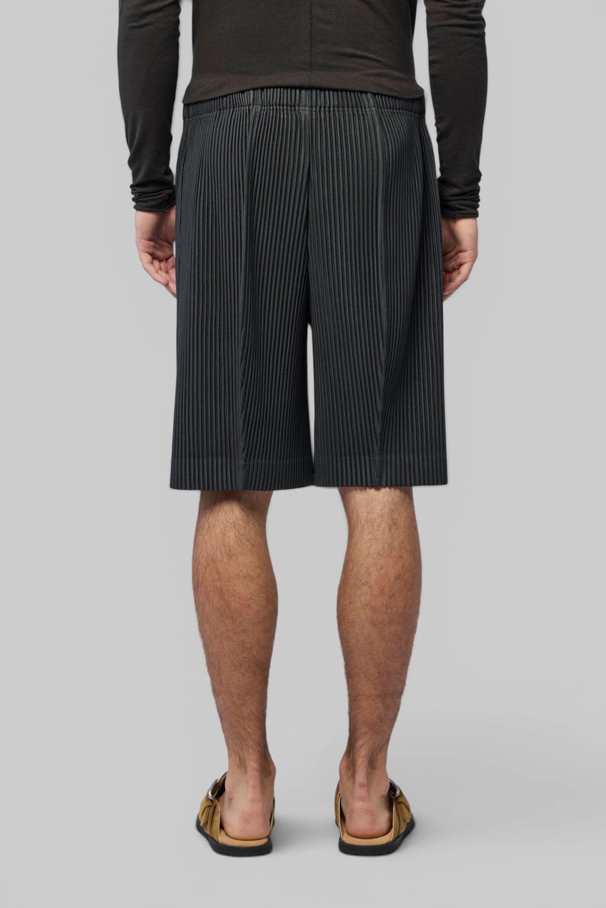 Homme Plissé Issey Miyake Shorts styled on model, full look