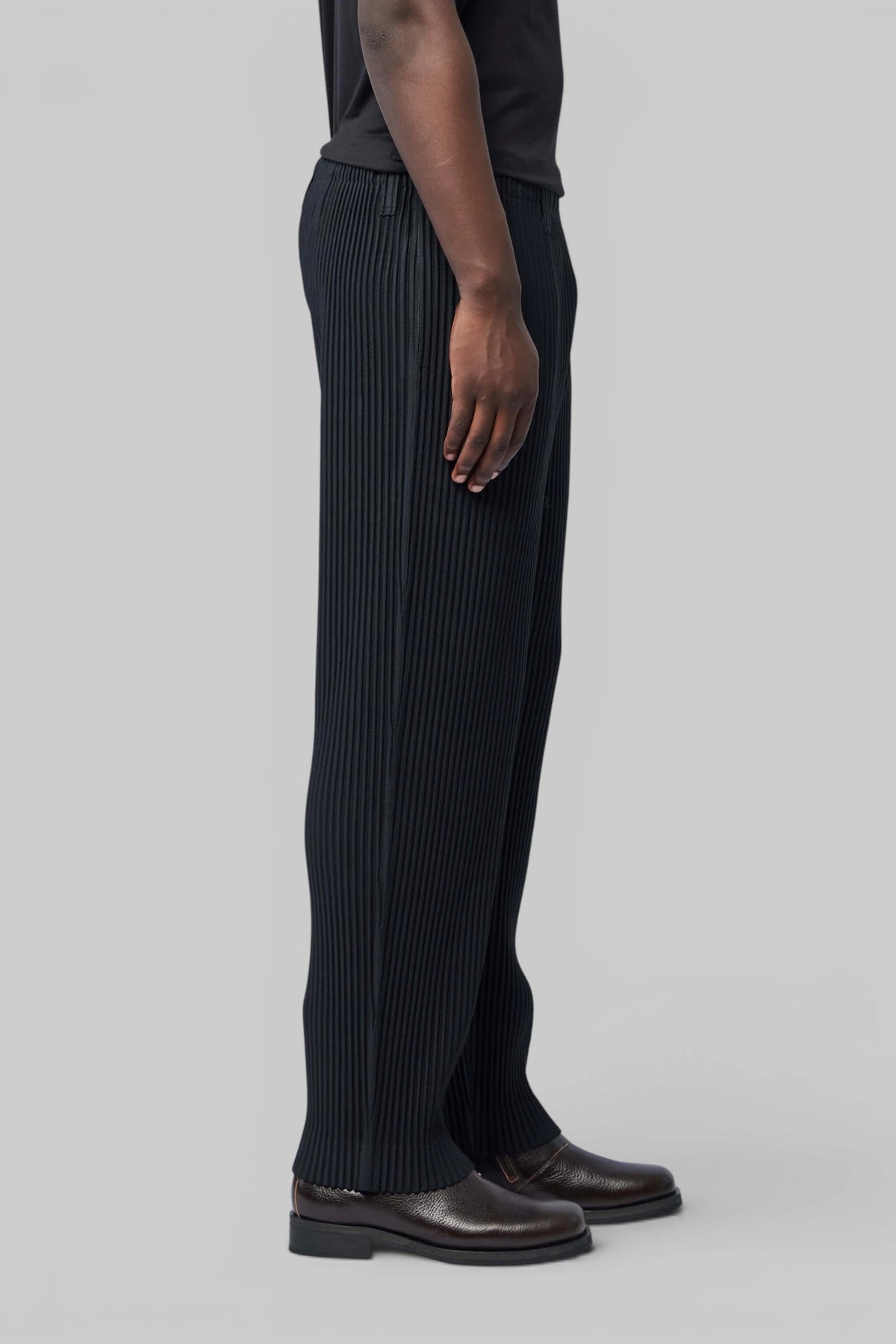 Homme Plissé Issey Miyake Straight Pants styled with matching outerwear