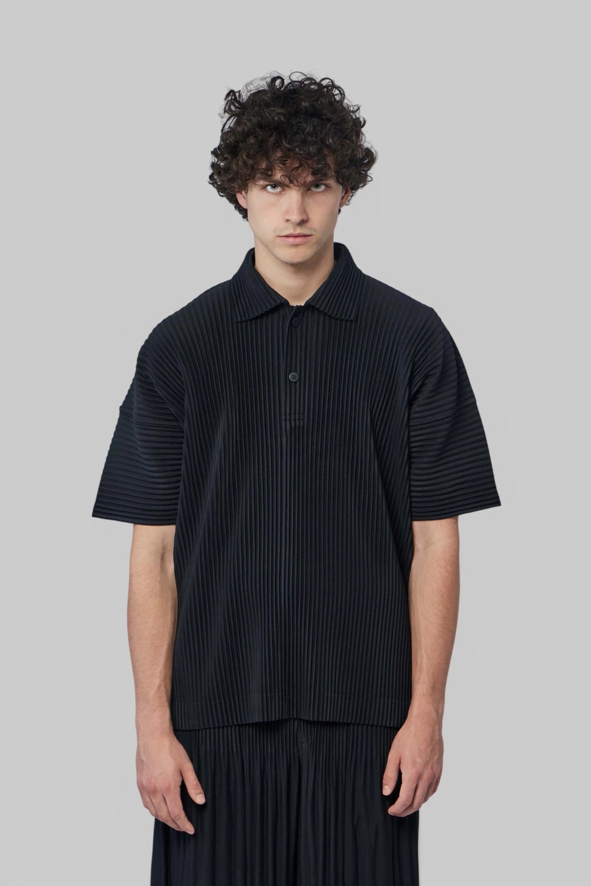 Close-up of textured pattern on Homme Plissé Issey Miyake Polo