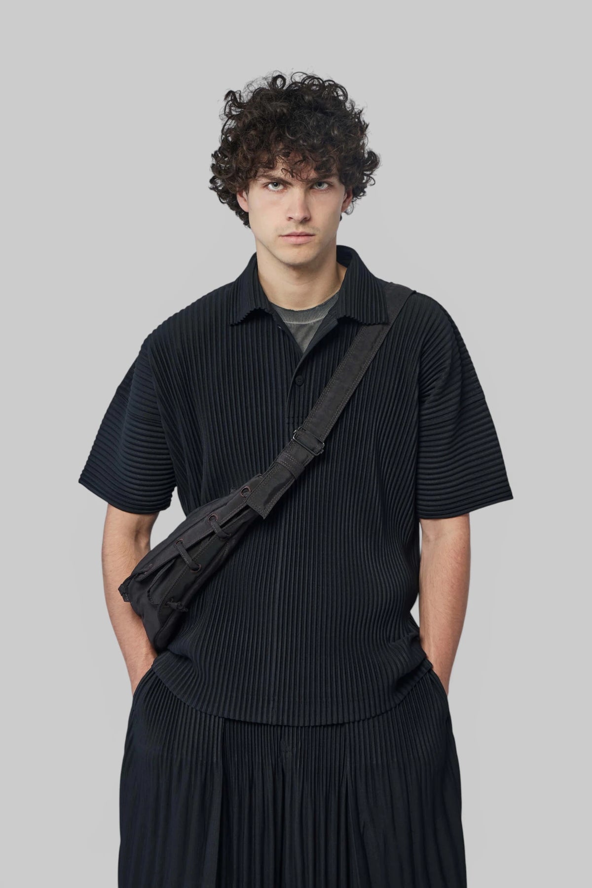 Homme Plissé Issey Miyake Polo Shirt with textured pleated fabric