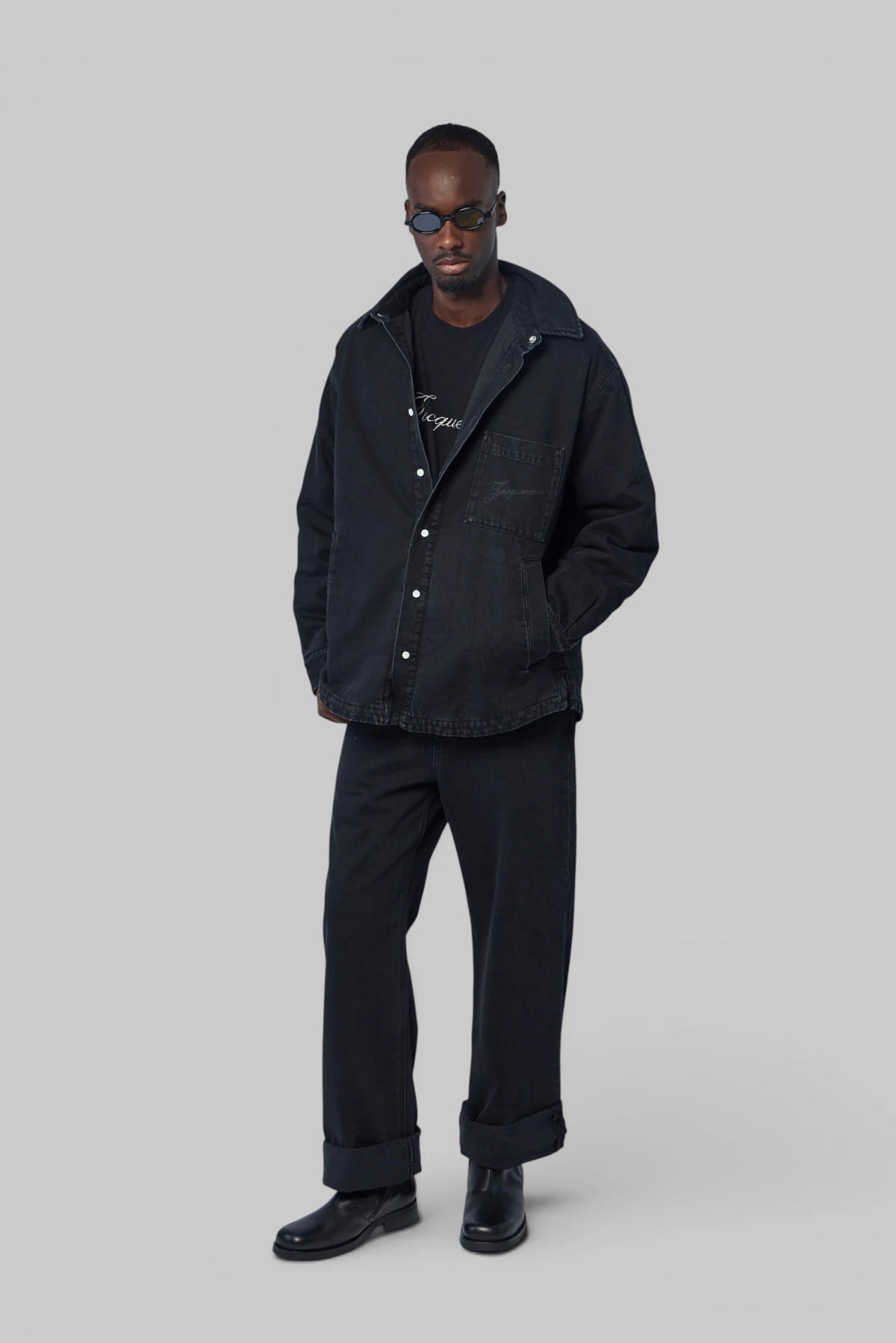 Front view of Jacquemus bomber jacket with button closure