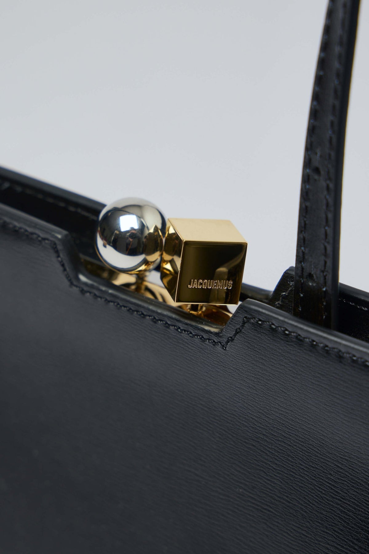 Jacquemus Le Salon bag styled with elegant outfit for formal occasion