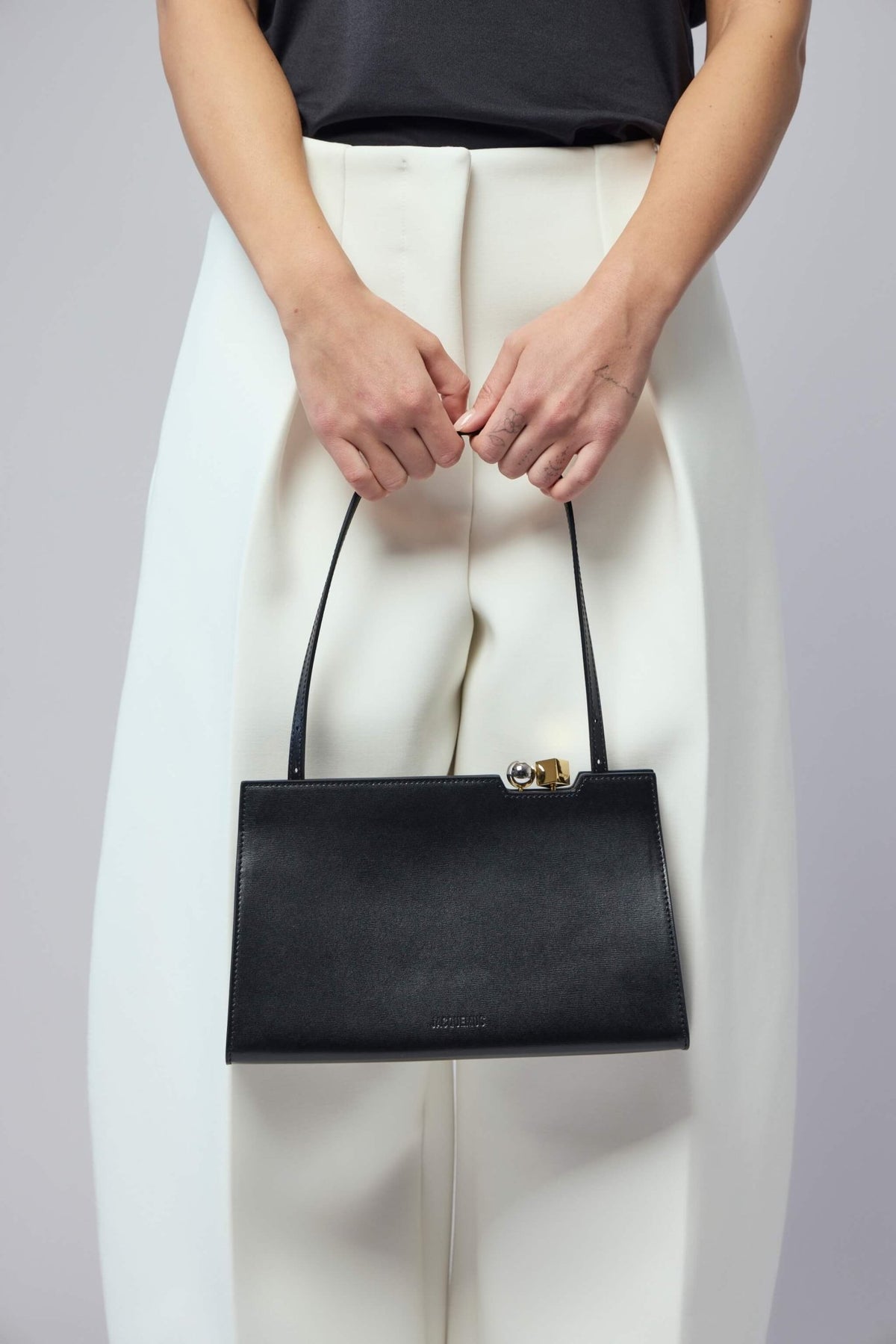 Interior view of Le Salon bag showing cotton lining and compartments