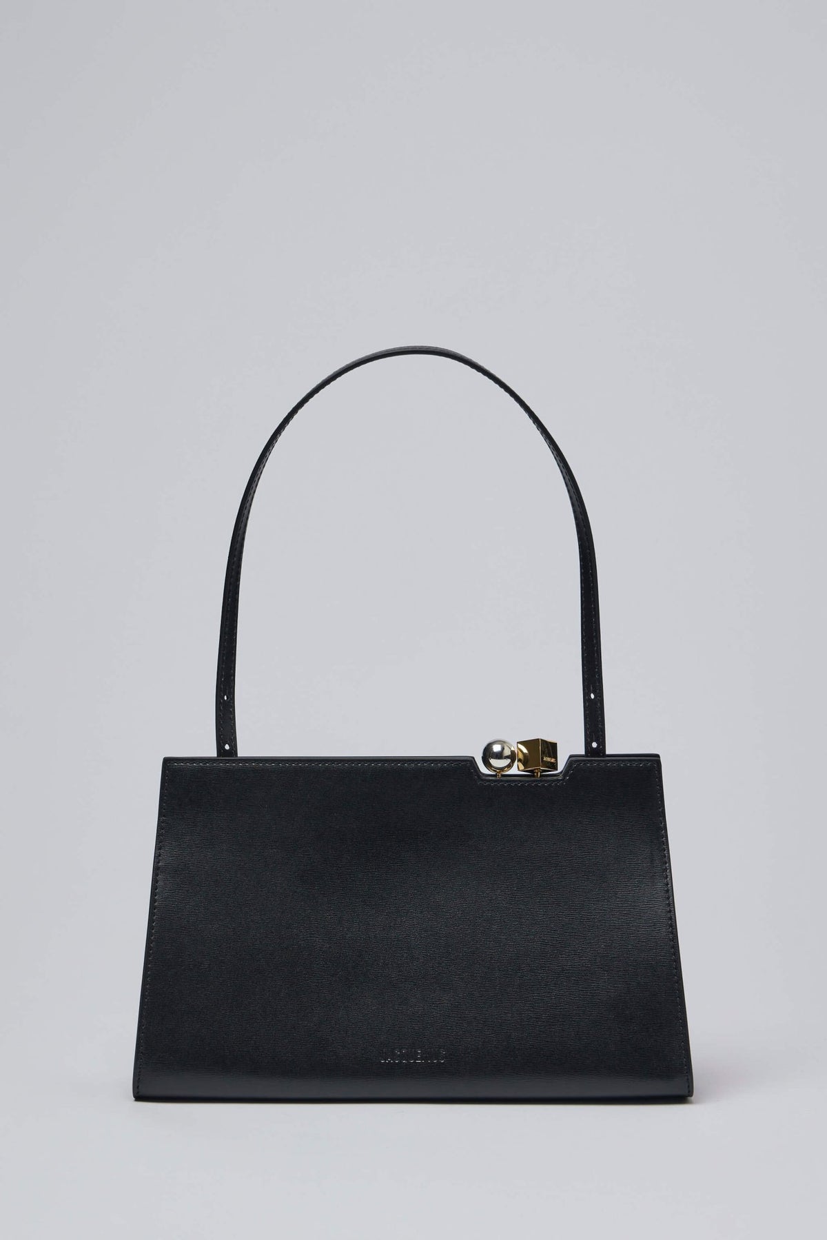 Jacquemus Le Salon black leather top handle bag with structured silhouette