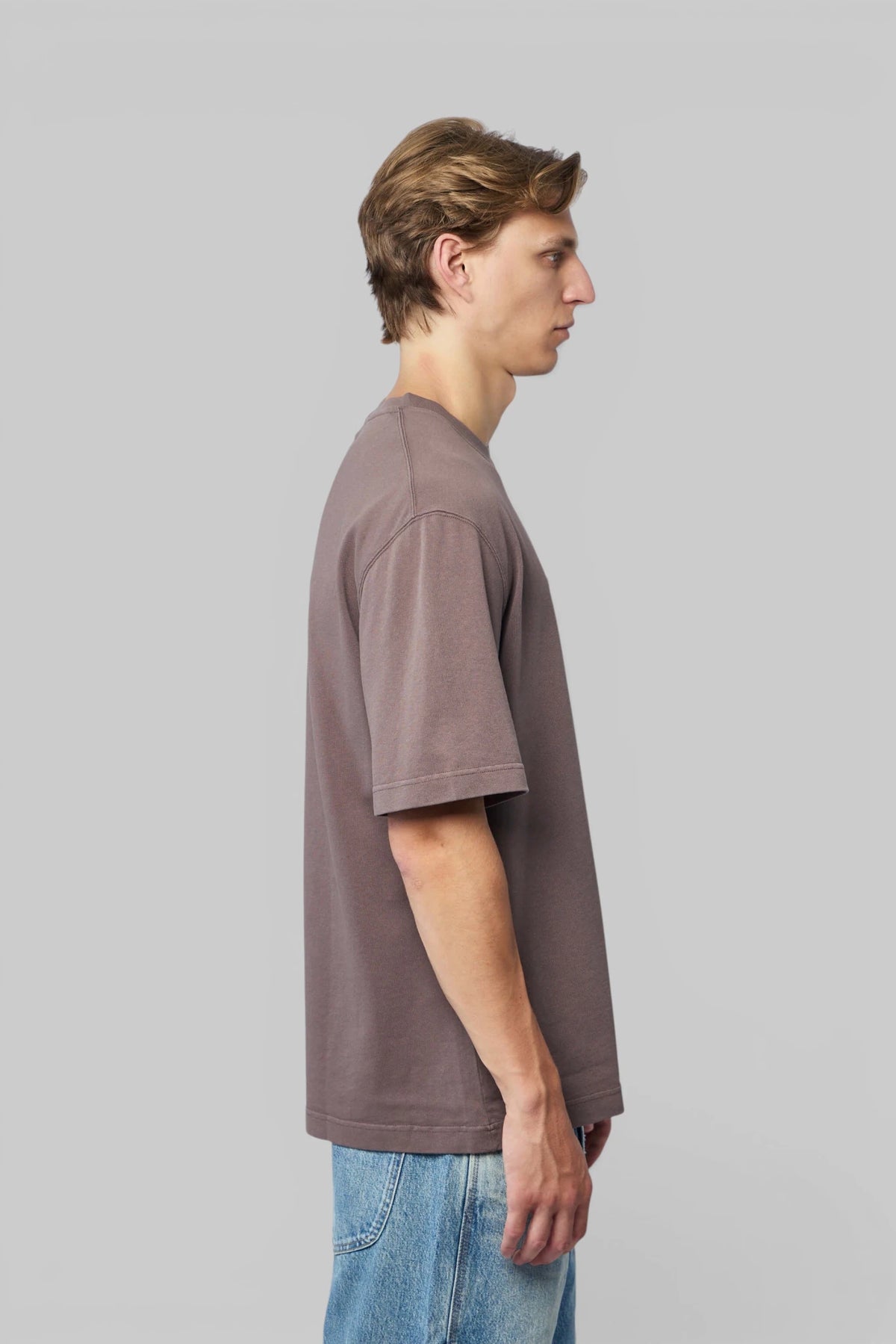 Model wearing Jacquemus Le Tshirt Gros Grain with tailored trousers