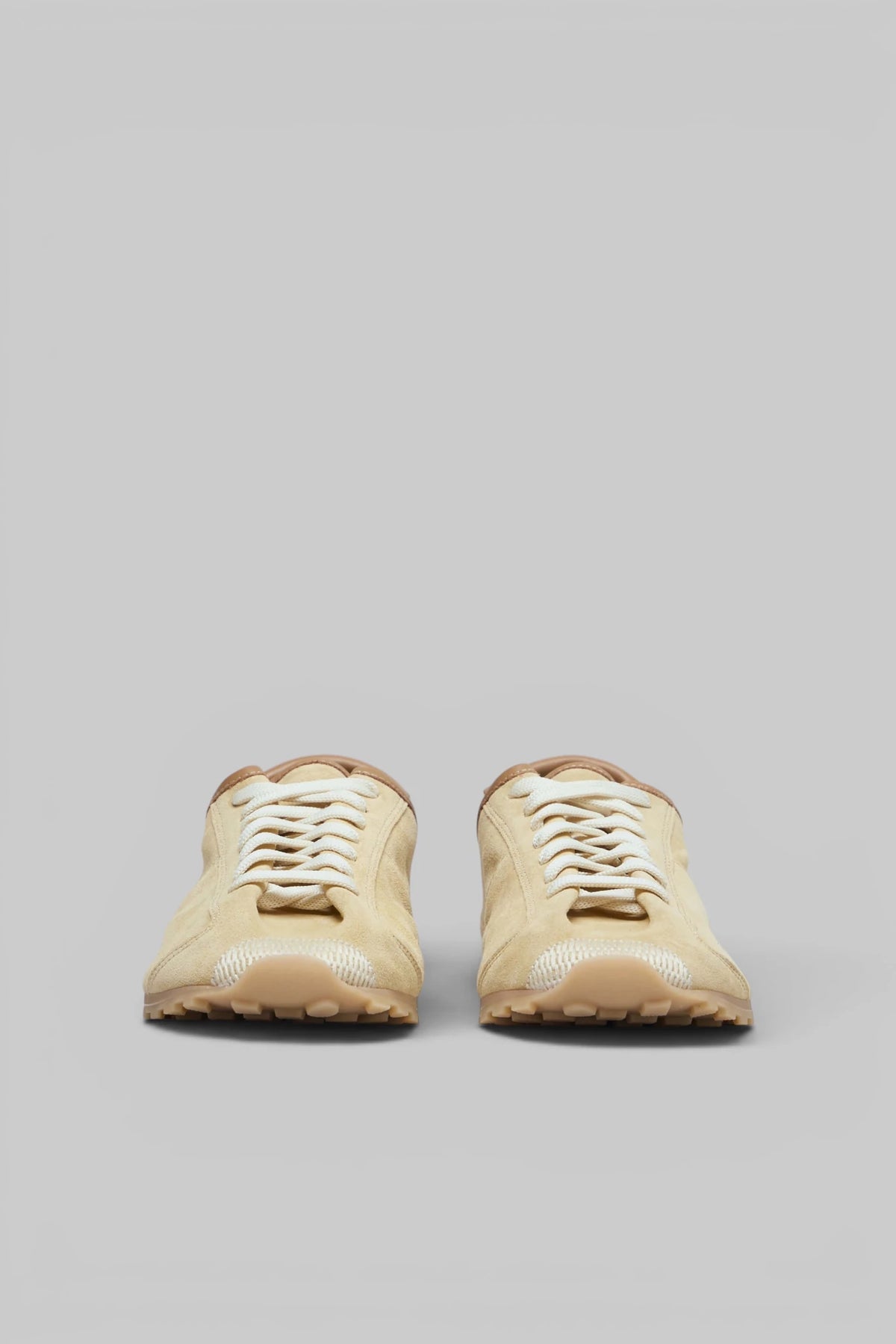 Jacquemus Les Tennis sneakers showing contrast heel tab detail