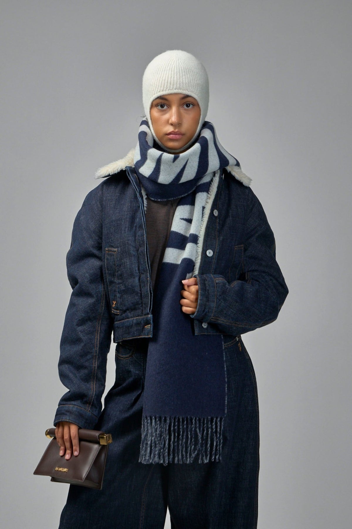 Jacquemus Ovalo de-Nîmes Denim Jacket in dark indigo with cream shearling collar