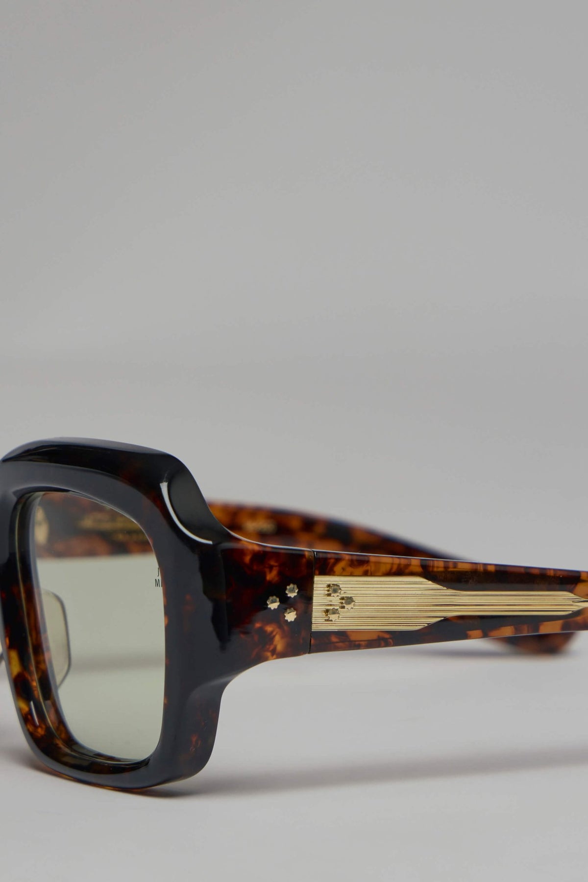 Jacques Marie Mage sunglasses displayed on neutral background showing lens gradient, view 7