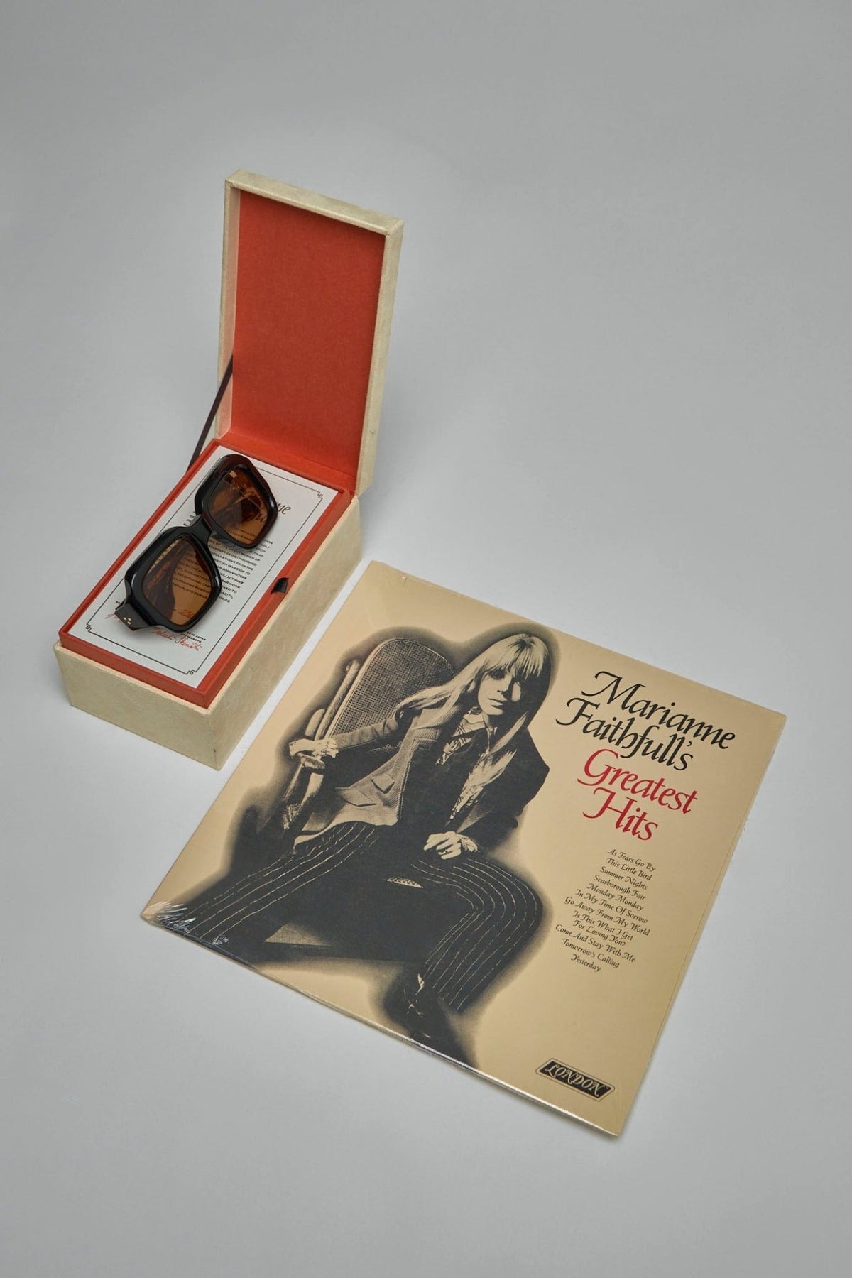 Premium sunglasses displayed against neutral background showcasing craftsmanship, view 8