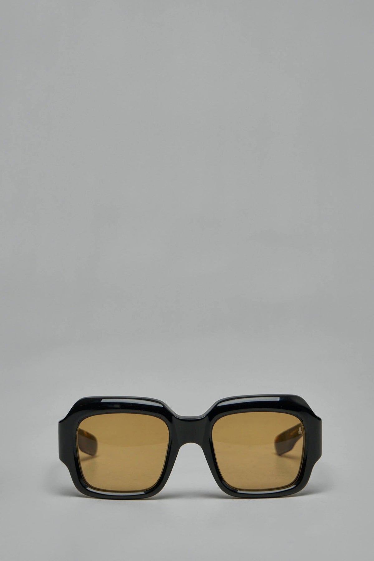 Jacques Marie Mage sunglasses with oversized square black acetate frames and amber lenses