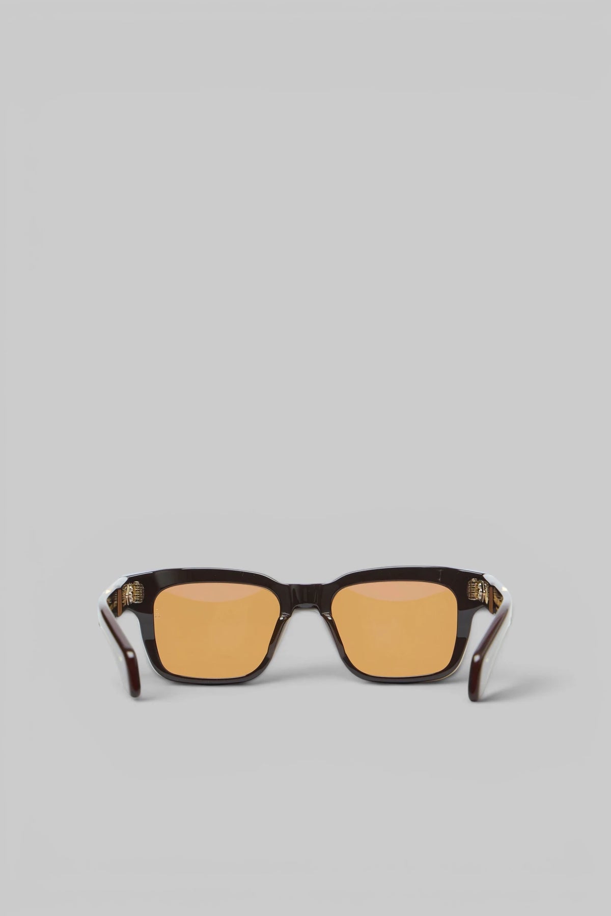 Close-up of orange-tinted lenses on Jacques Marie Mage Molino