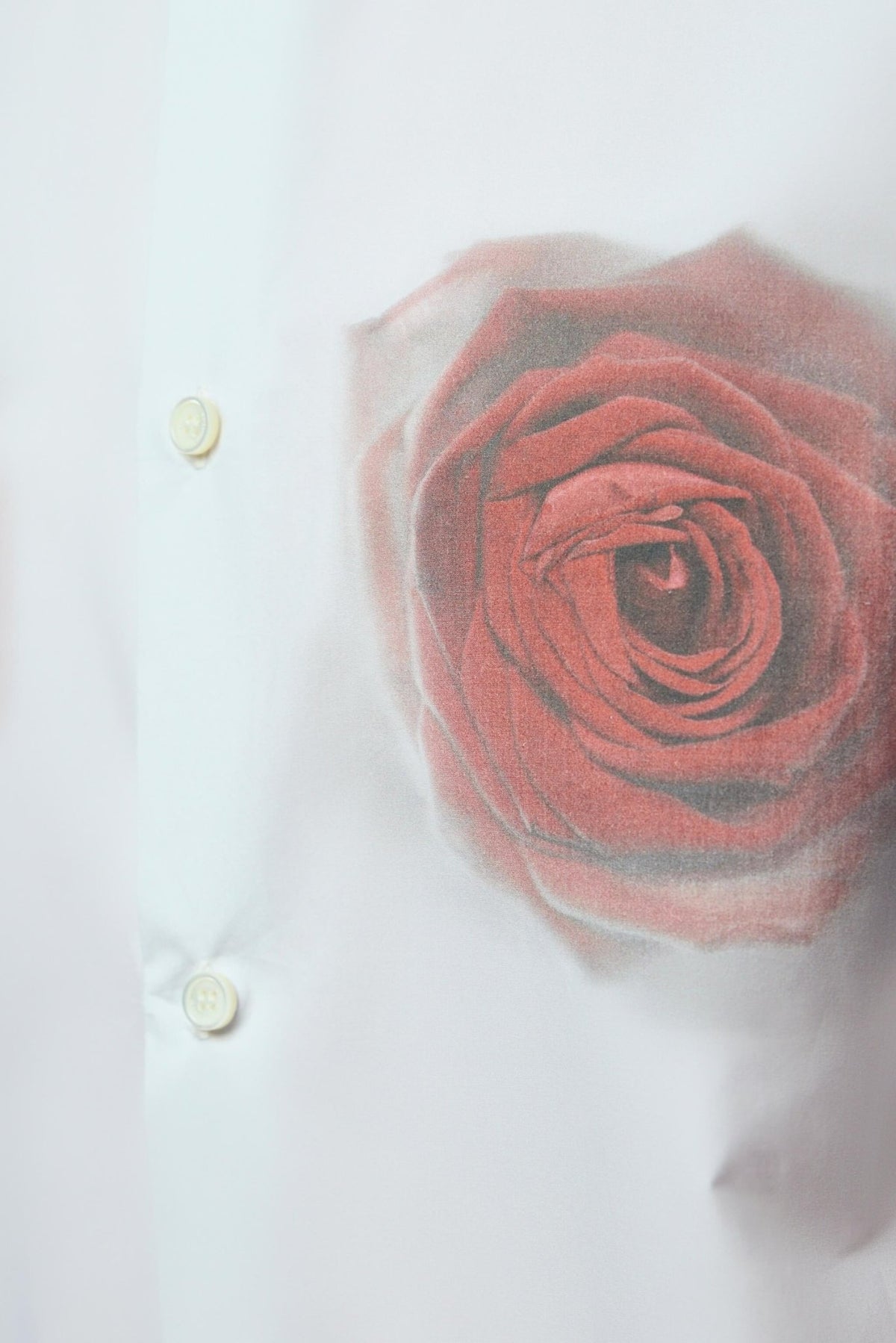 Jean Paul Gaultier blouse styling - button-up front and pointed collar detail