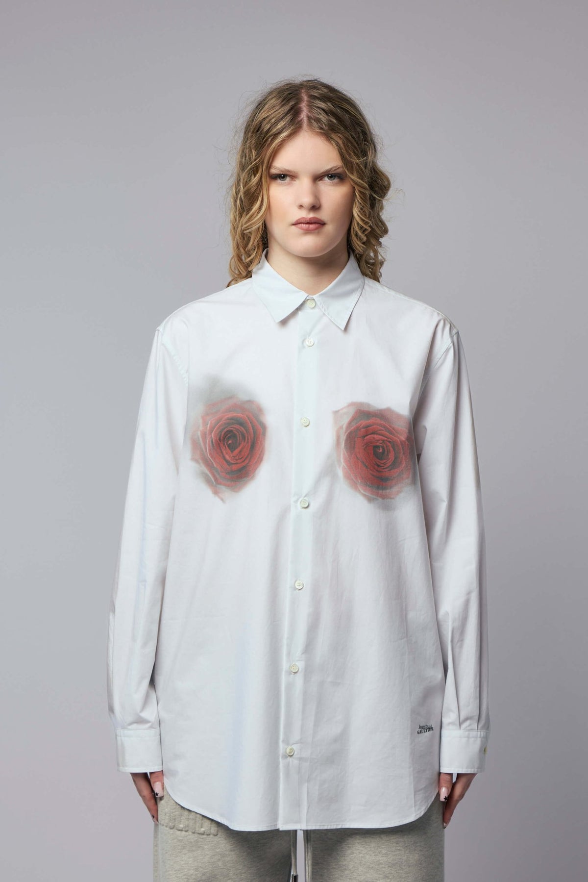 Close-up of blurred rose print detail on Jean Paul Gaultier shirt