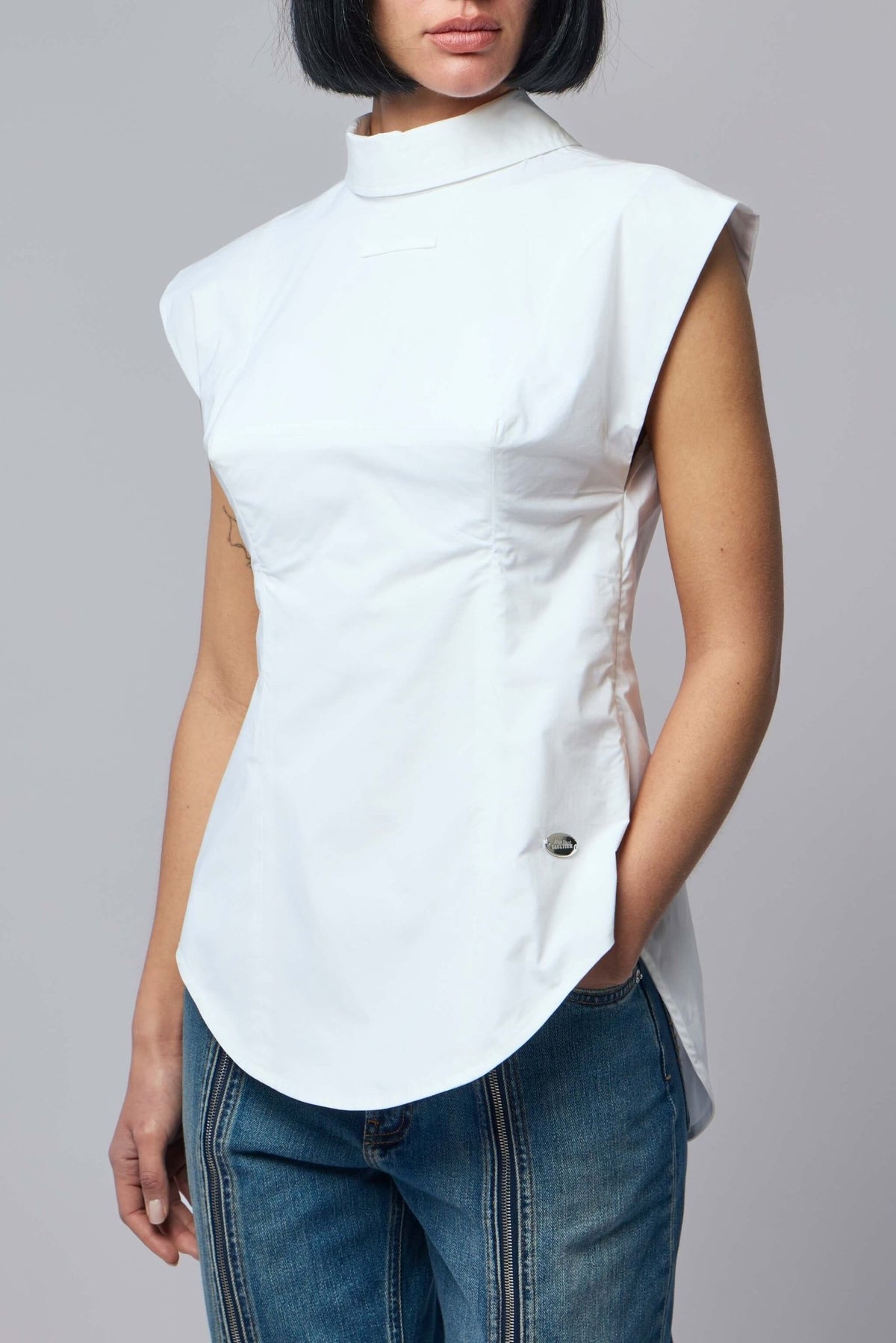 Model wearing Jean Paul Gaultier reversed shirt showing fitted silhouette