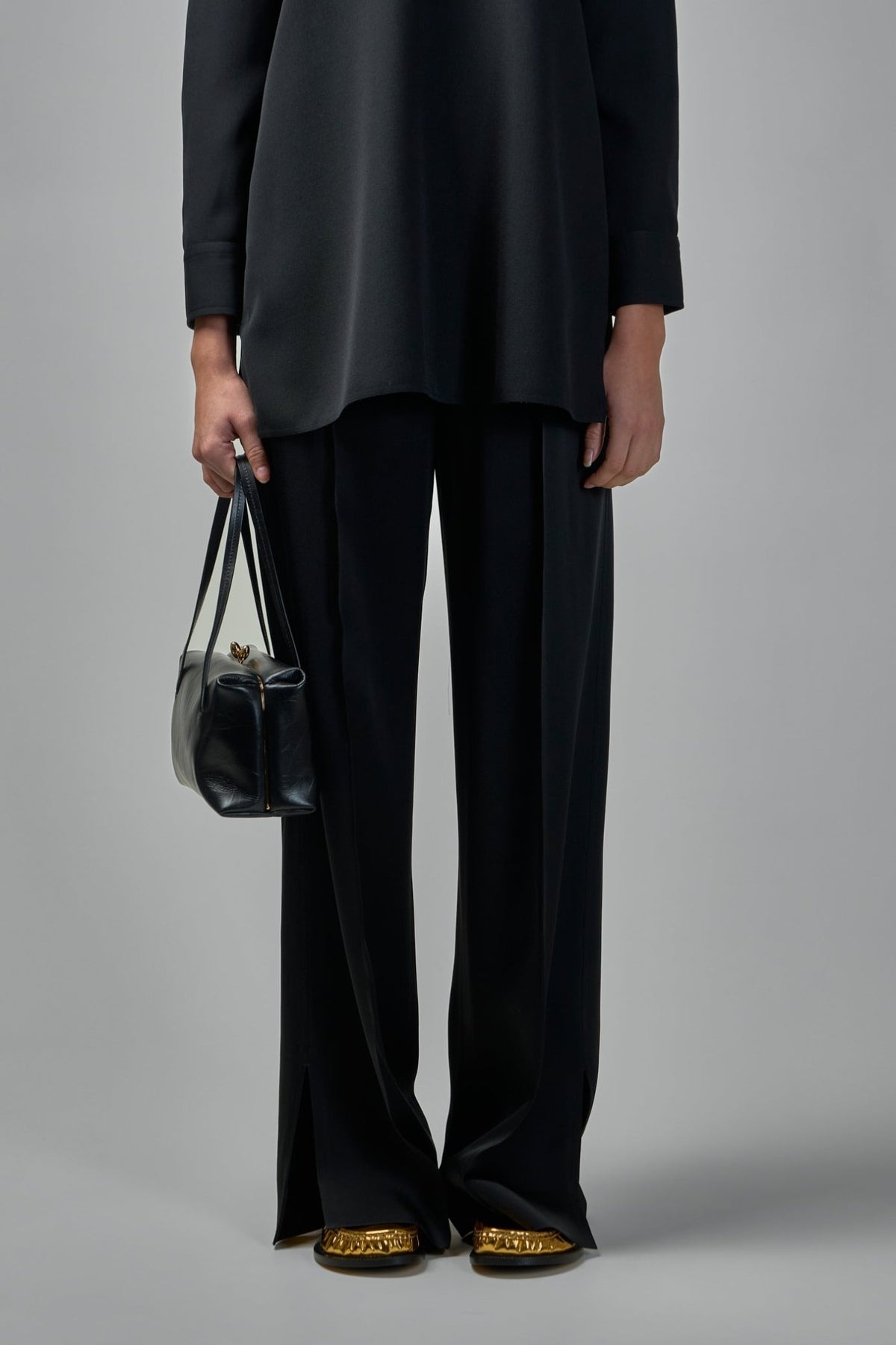 Jil Sander wide-leg pants in black satin with elastic waistband