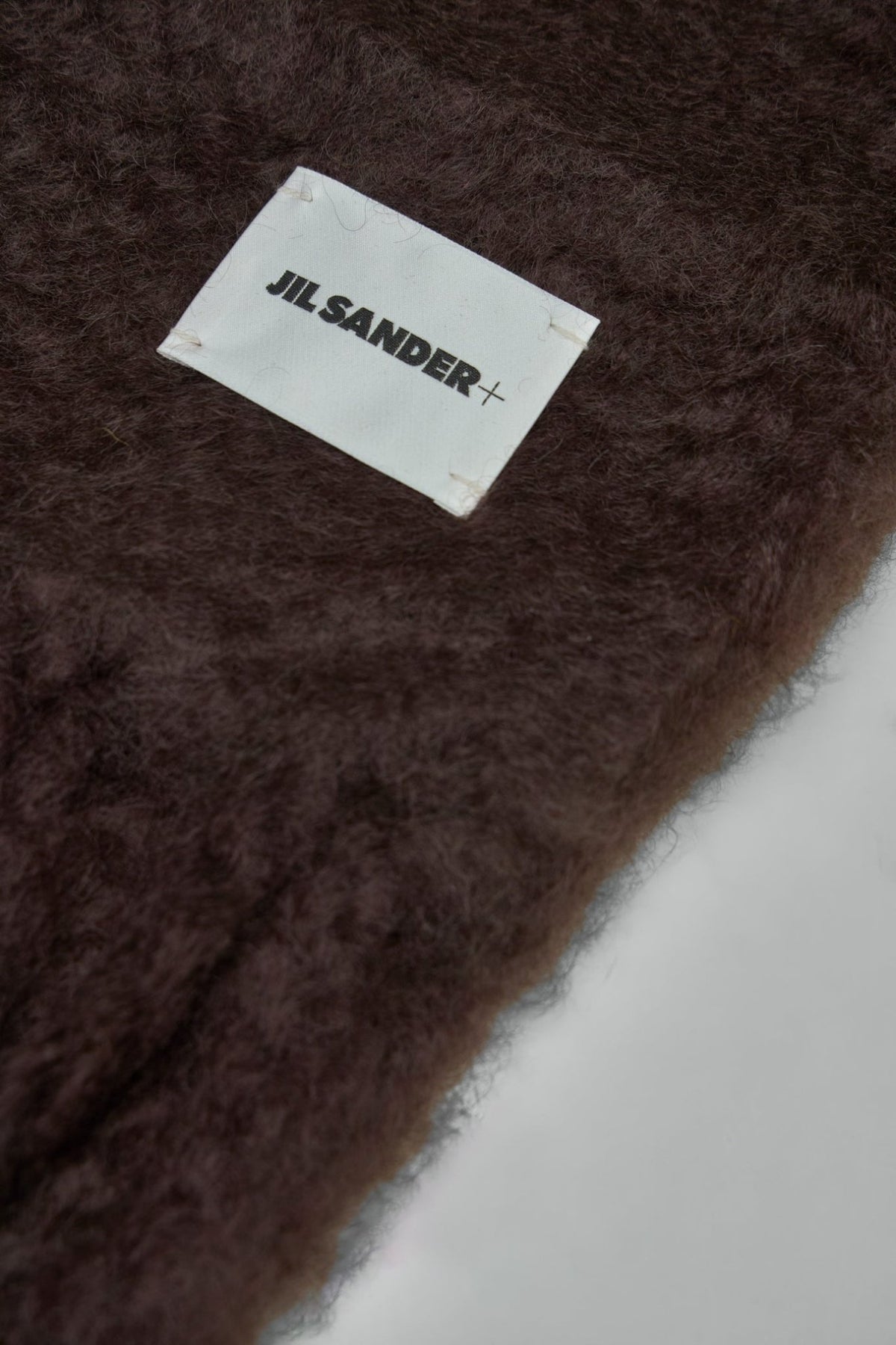 Jil Sander scarf showing fringe detail and rectangular shape