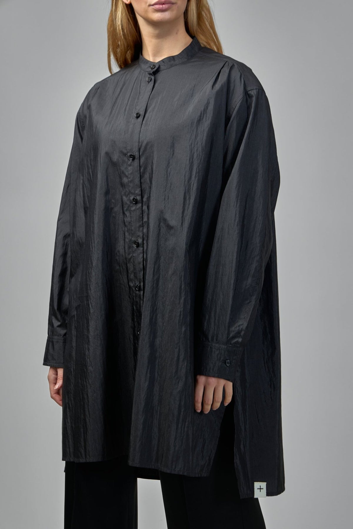 Back view of minimalist Jil Sander wool poplin shirt design