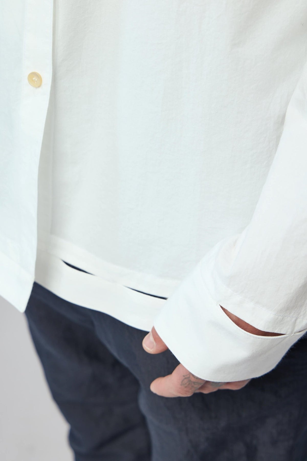 K'ang men's shirt front view showing clean lines and premium cotton fabric