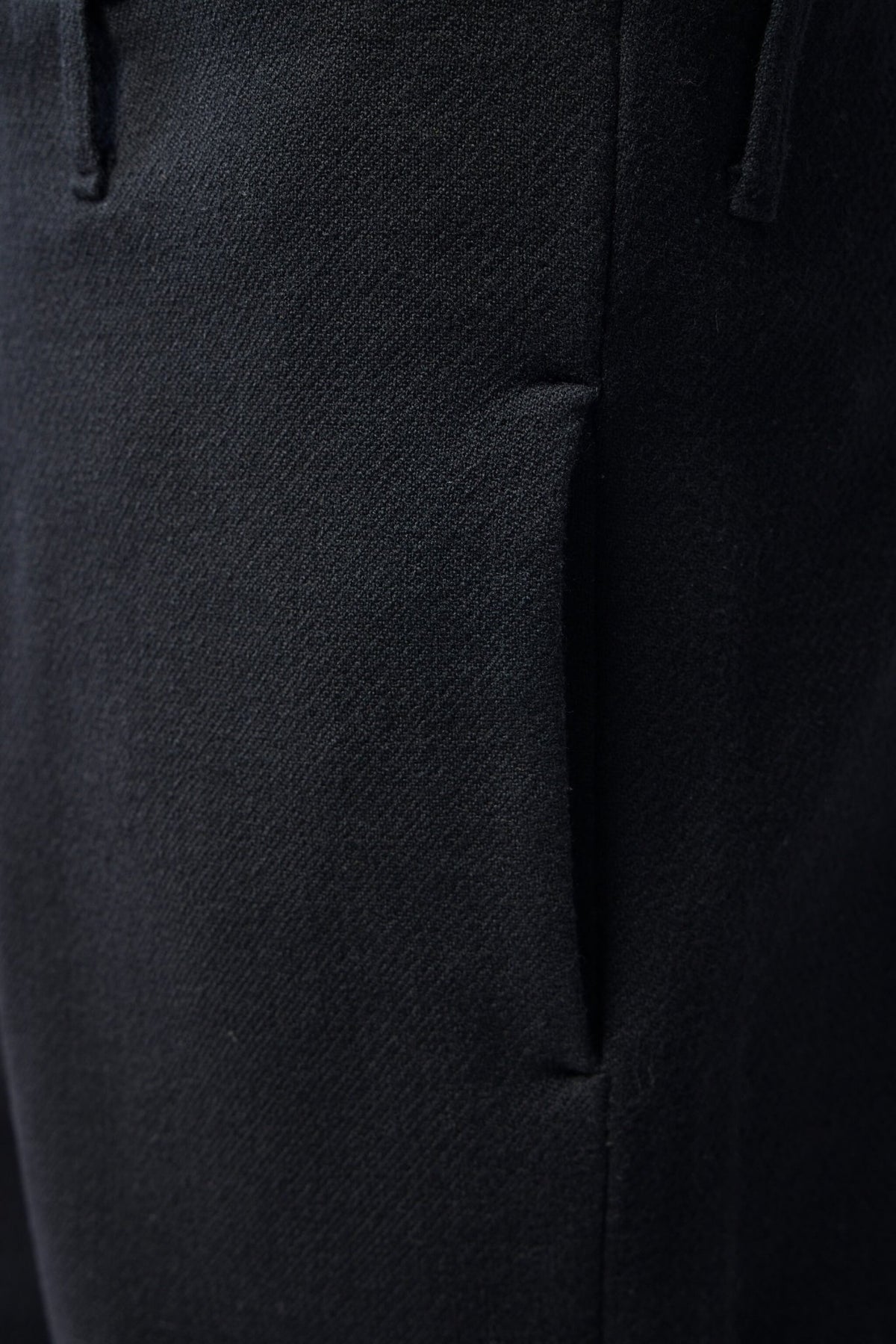 Detail shot of virgin wool fabric texture on K'ANG pants