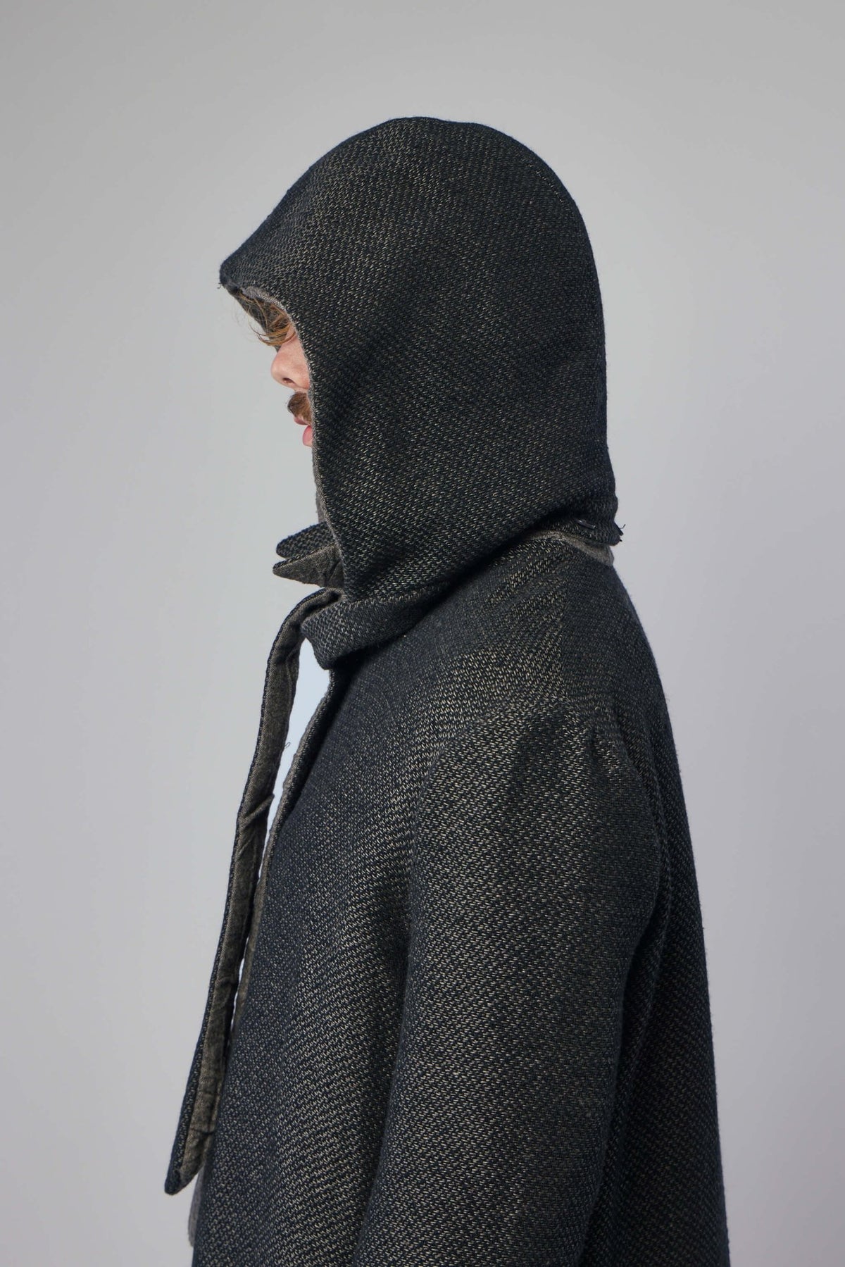 Detachable hood feature of K'ANG reversible coat showing versatile styling options, view 7